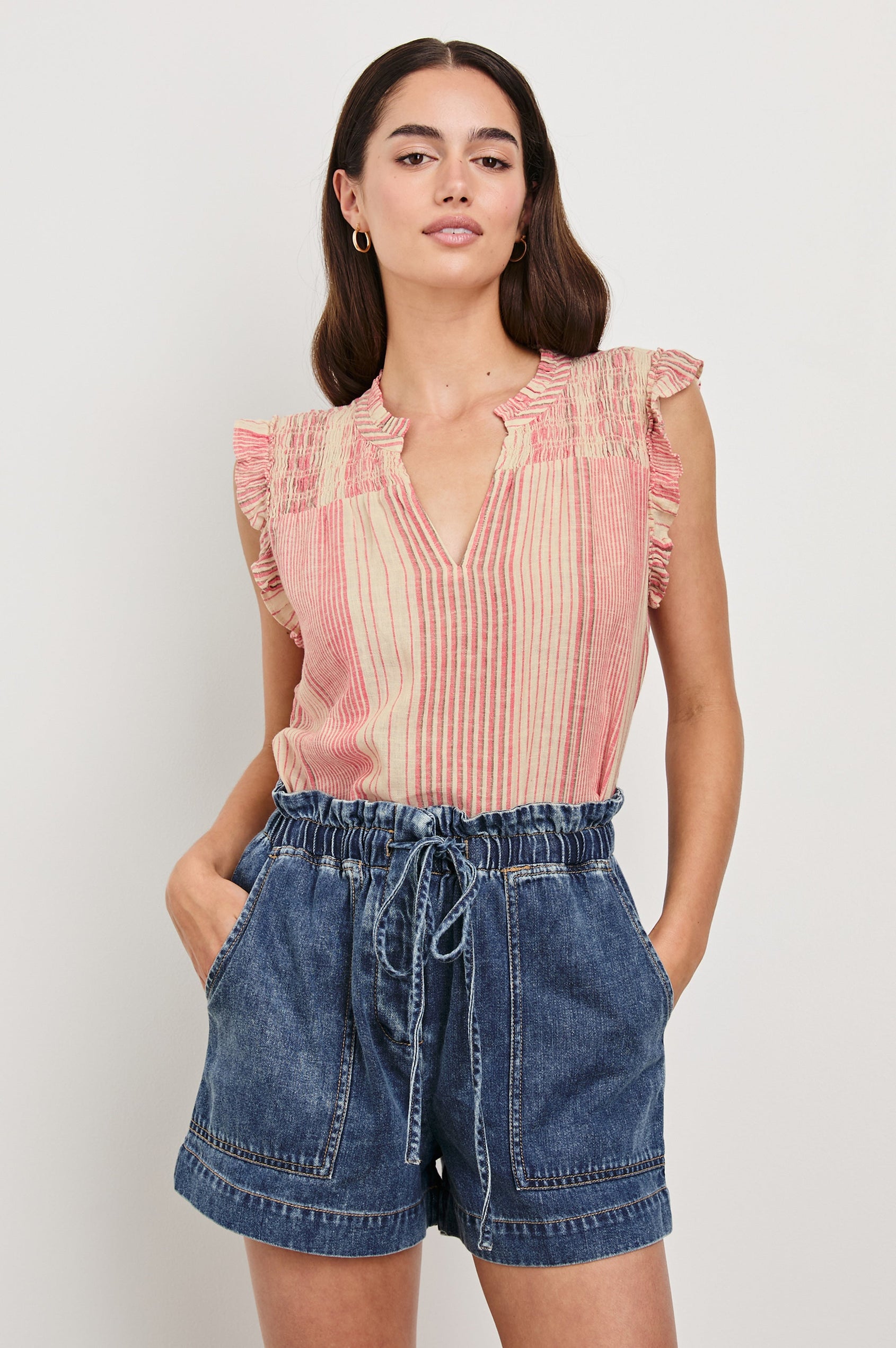 Arlene Top with Short Flutter Cap Sleeves, A V-Neckline and Shirring Along the Top Front in Salerno Stripe Colorway, Vertical Stripes in Sand and Salmon - Front Tucked View Featured on Model