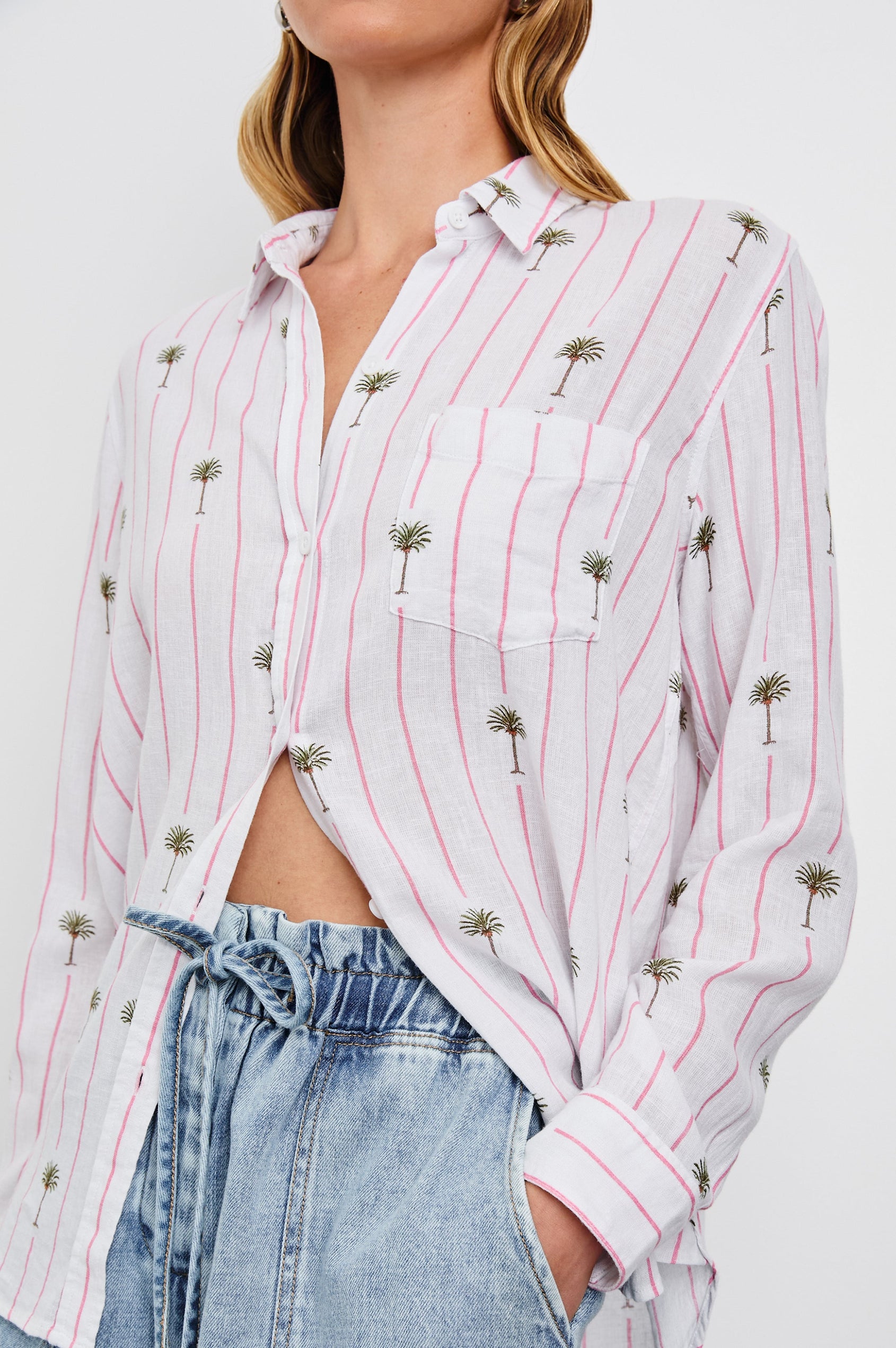 Charli Long-Sleeve Button up with a Chest Patch Pocket in Pink Palm Colorway, with pink vertical stripes dashed with palm trees on ivory - Front View Featured on Model