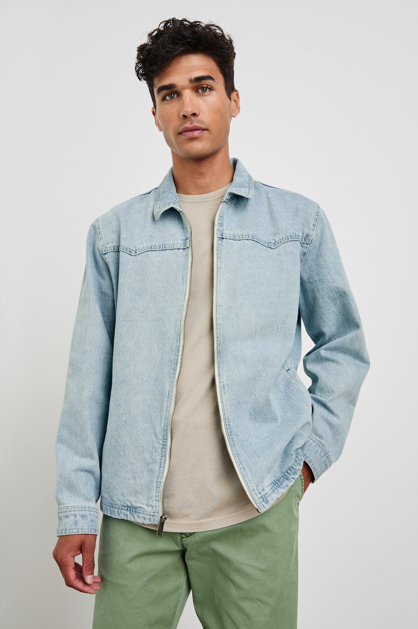 Cooke western style zip-up jacket with contrast stitching details in Light Wash - front view on model, unzipped
