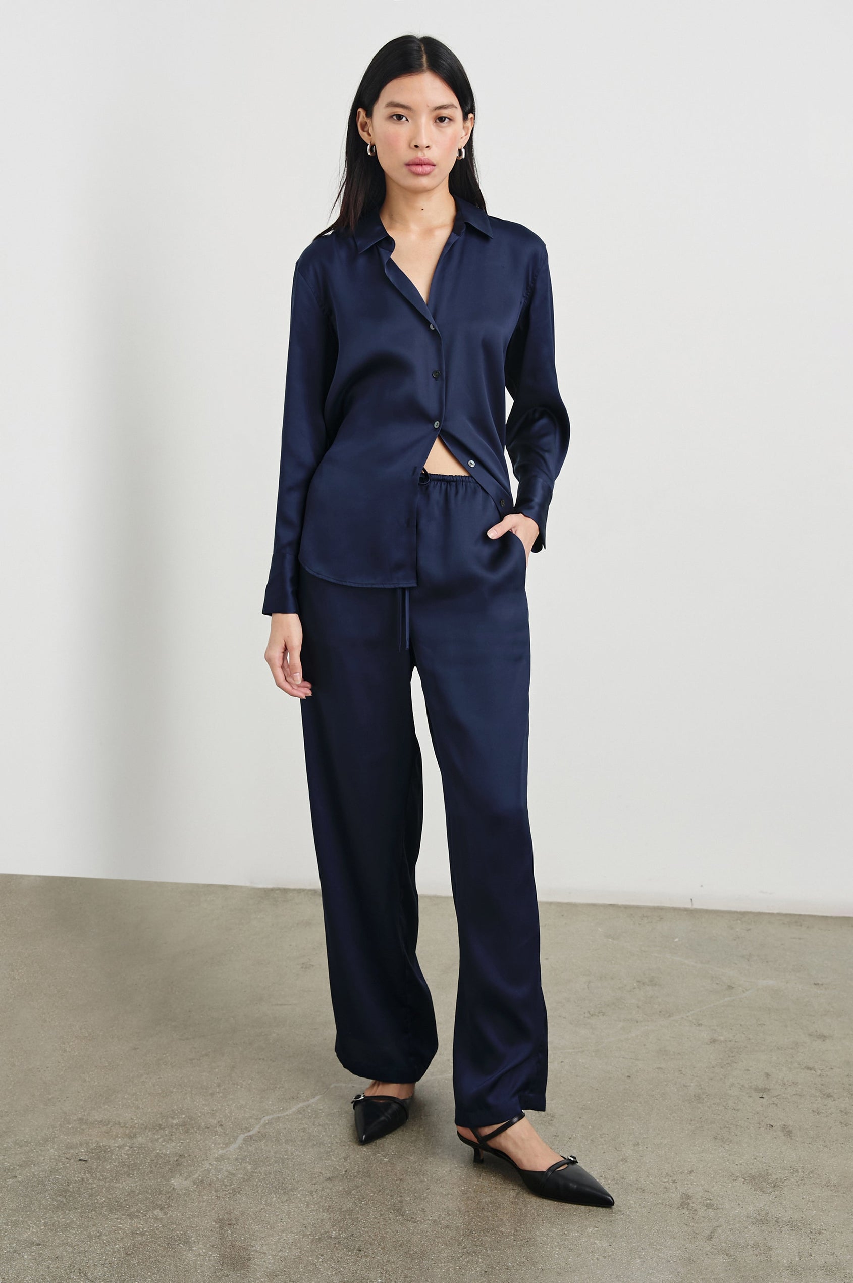 Damini Pants with a Drawstring Waist and Two Front Pockets in Navy Colorway - Front Full Body View Featured on Model