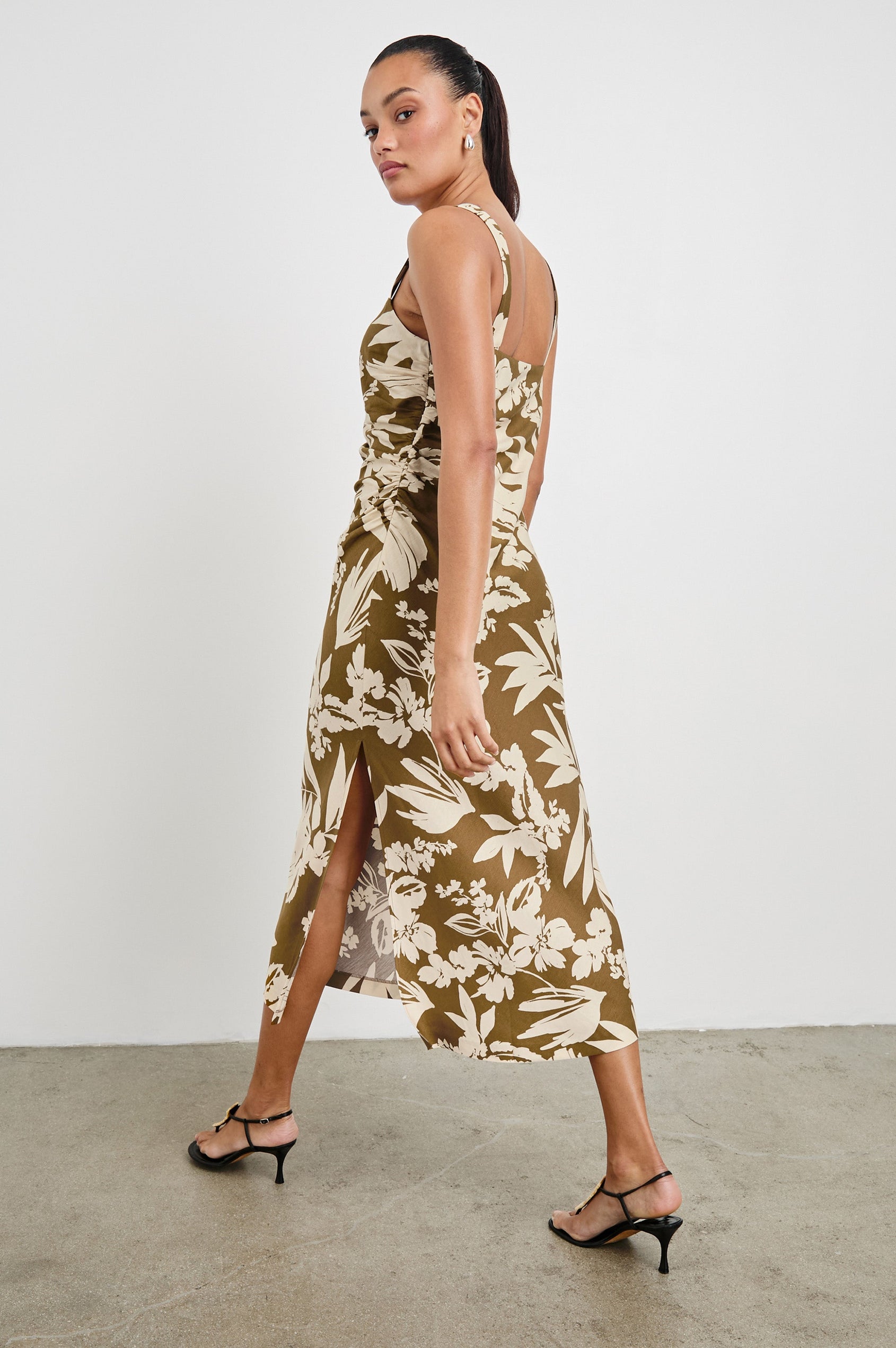 Damaris Midi Tank Dress with a Square Neck Opening, Side Seam Ruching and a Slit on Left Side Hem in Olive Tropic Colorway. Full Body Back View Shown on Model.