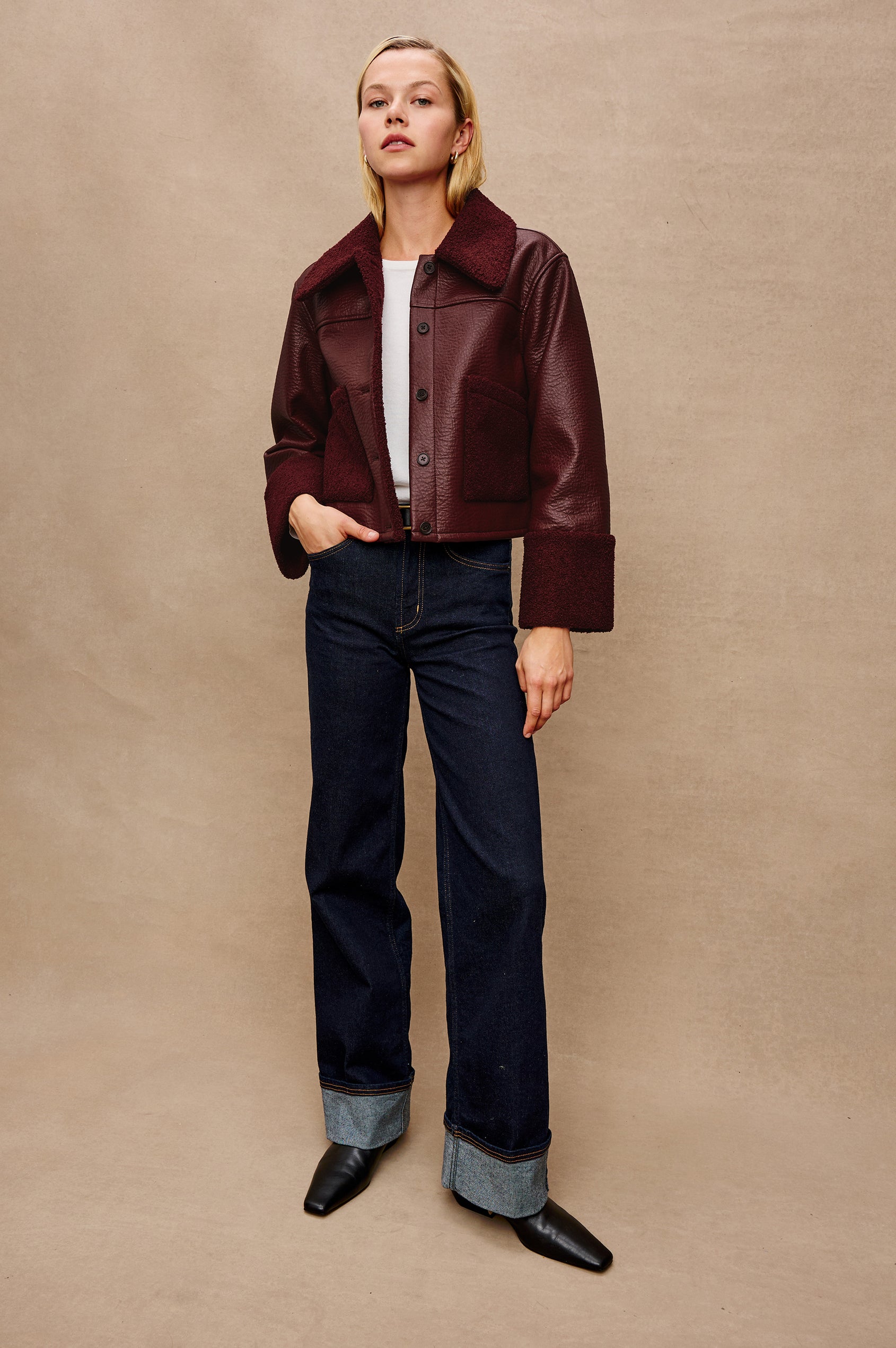 Dria Jacket with Button Closure, Two Front Patch Pockets and Faux Shearling at the Pockets, Cuffs, Collar and Opening in Maroon Shearling Colorway, Front Full Body View Featured on Model