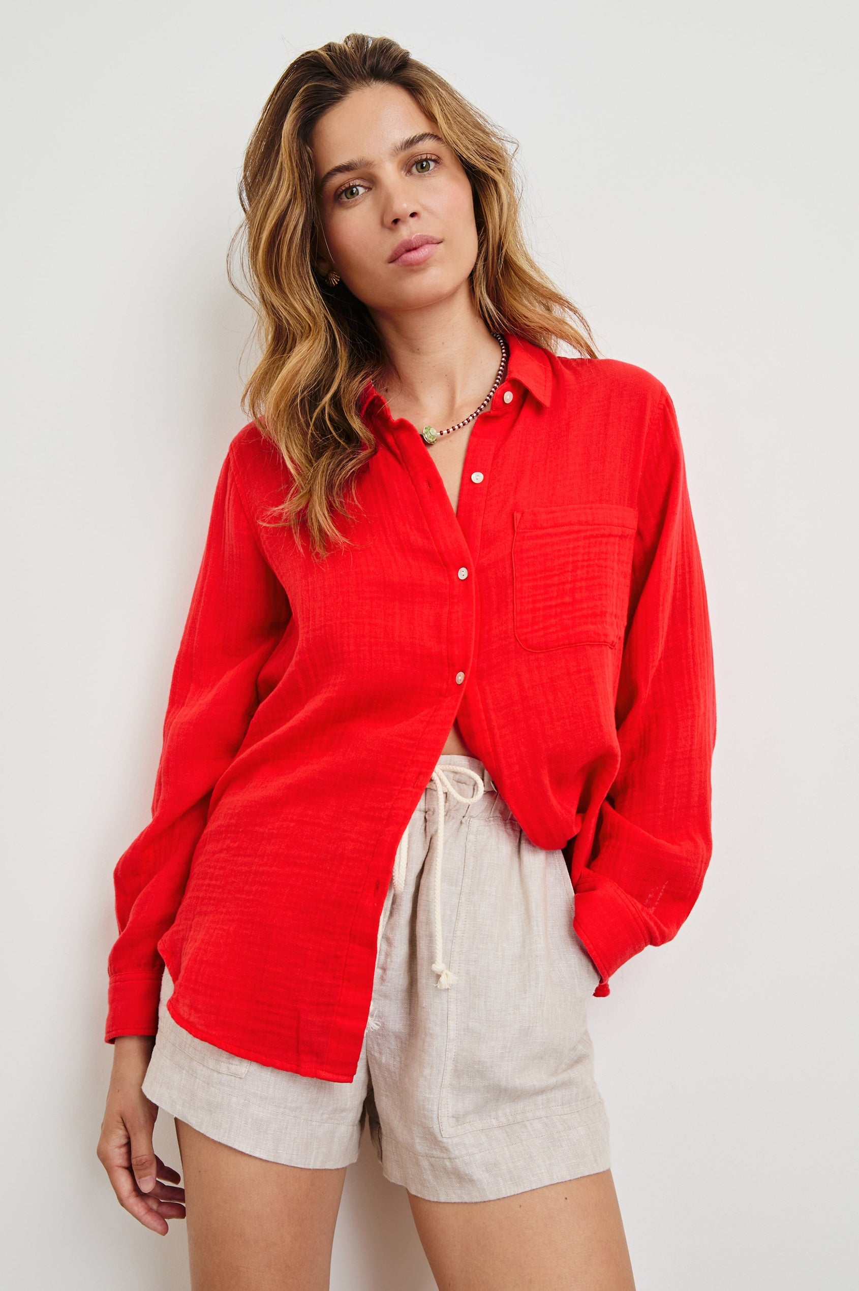 Ellis long sleeve loose fitting button up with single chest pocket in Cherry - front view on model