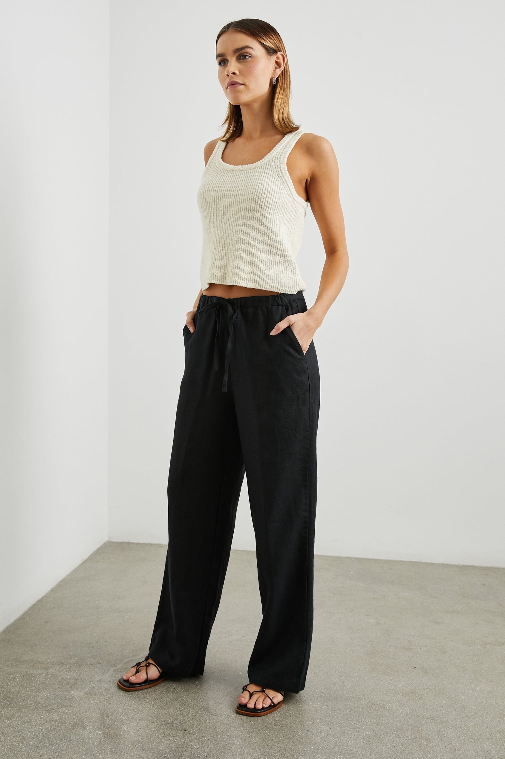 Emmie Pants with a Drawstring Waist and Two Front Pockets in Black Colorway - Front Full Body View Featured on Model