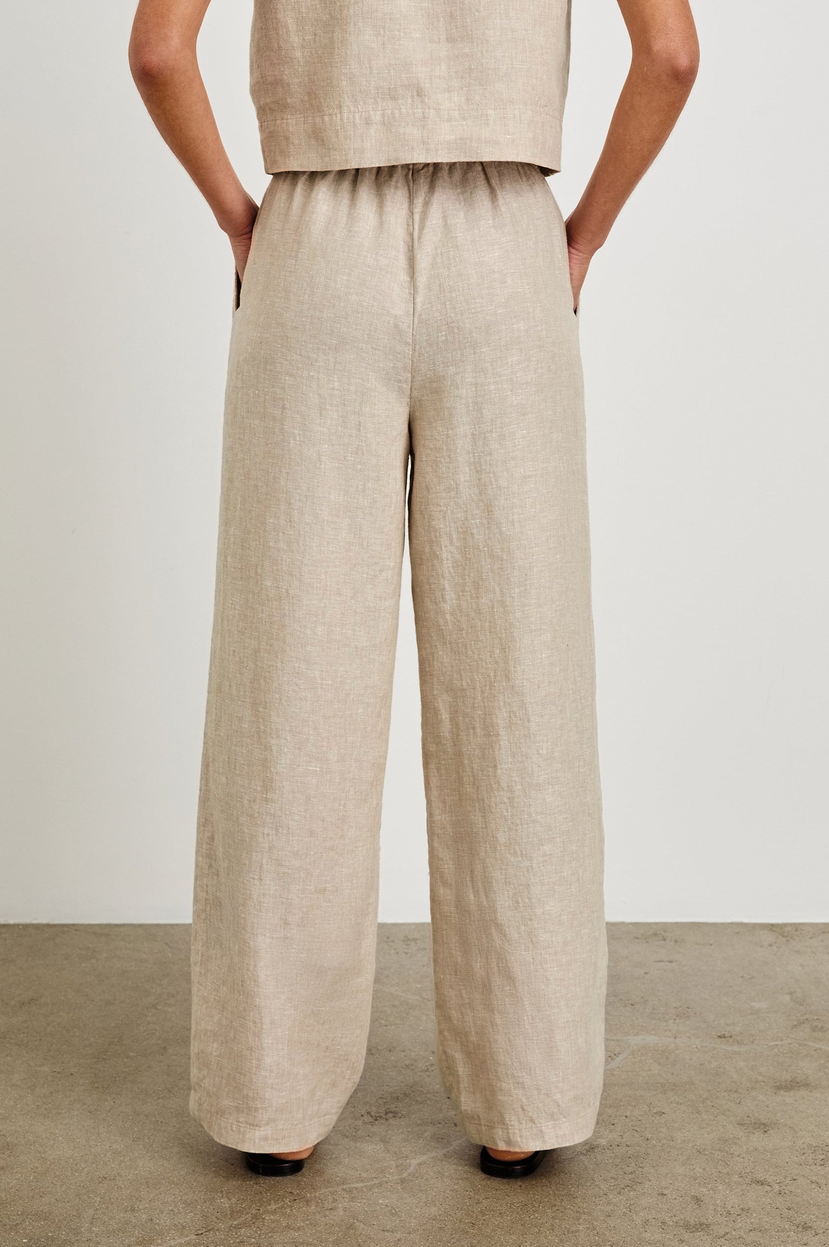 Emmie high rise linen wide leg pant with drawstring in Heathered Flax - back view on model