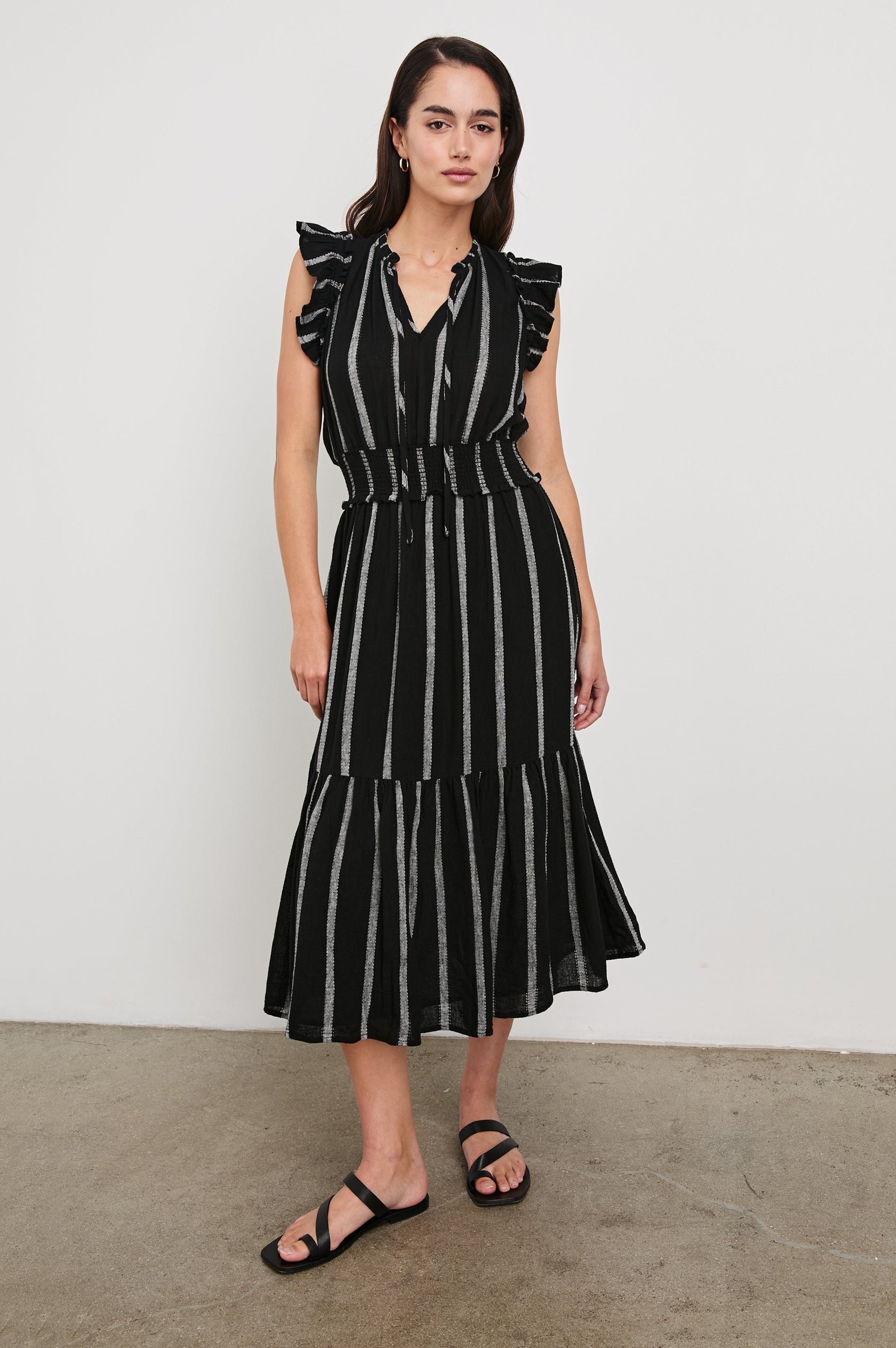 Garden Midi Dress with Flutter Cap Sleeves, Drawstrings at V-Neck and Shirred Waistband in Ash Leno Stripe Colorway, with Grey Vertical Stripes on Black - Front Full Body View Featured on Model
