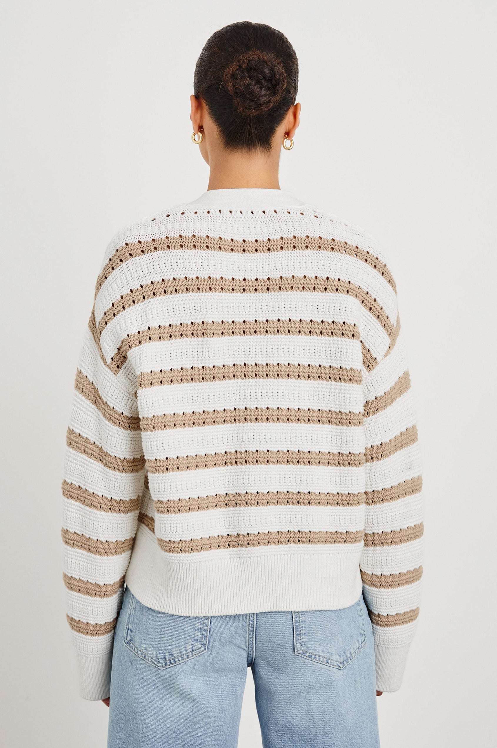 Geneva cropped cardigan sweater with front buttons and contrast trimmings in Ivory Oat Stripe - back view on model