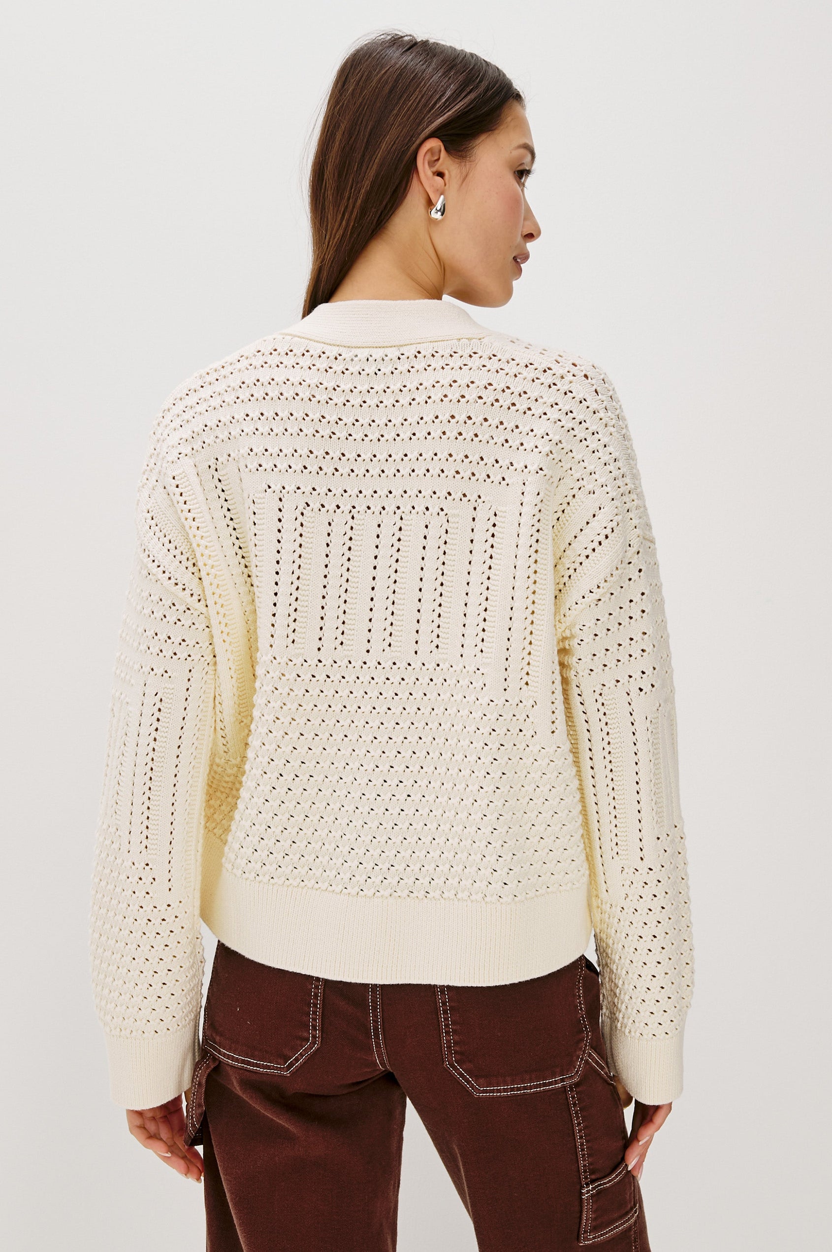Geneva cropped cardigan sweater with front buttons and pointelle details in Ivory Patchwork Pointelle Colorway - Back View Featured on Model