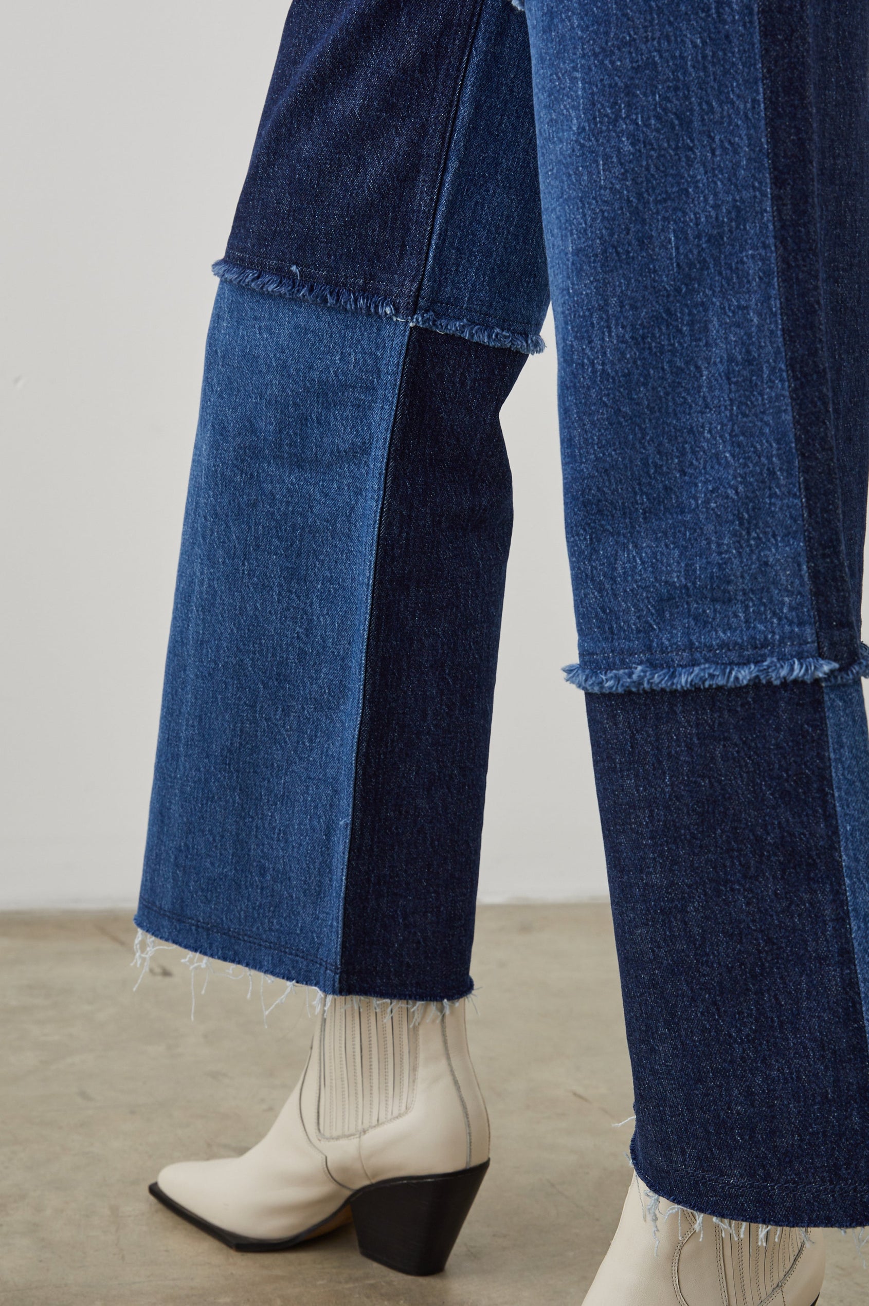 Getty Crop Wide Leg Denim Pants with Belt Loops, Two Front Pockets and Two Back Patch Pockets in Indigo Patchwork Colorway, with large patches in blues - Front View Featured on Model