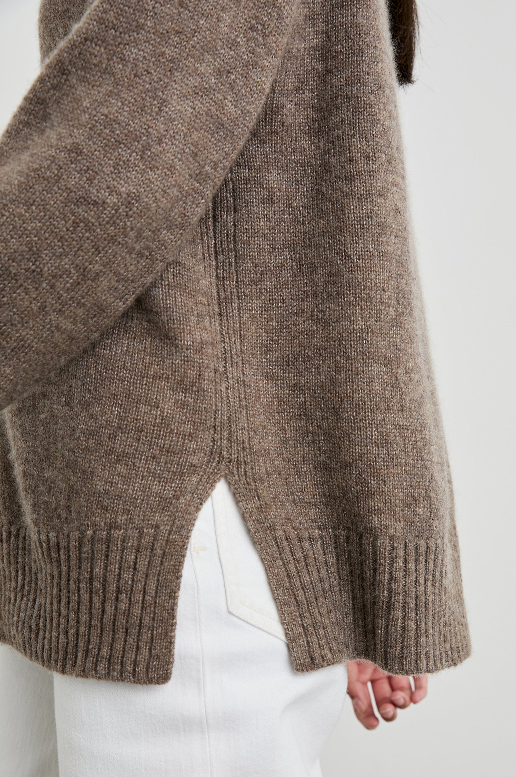 Gisella Long-Sleeve V Neck Sweater with Ribbed Trim and Side Slits in Hazelnut Colorway - Side View Featured on Model