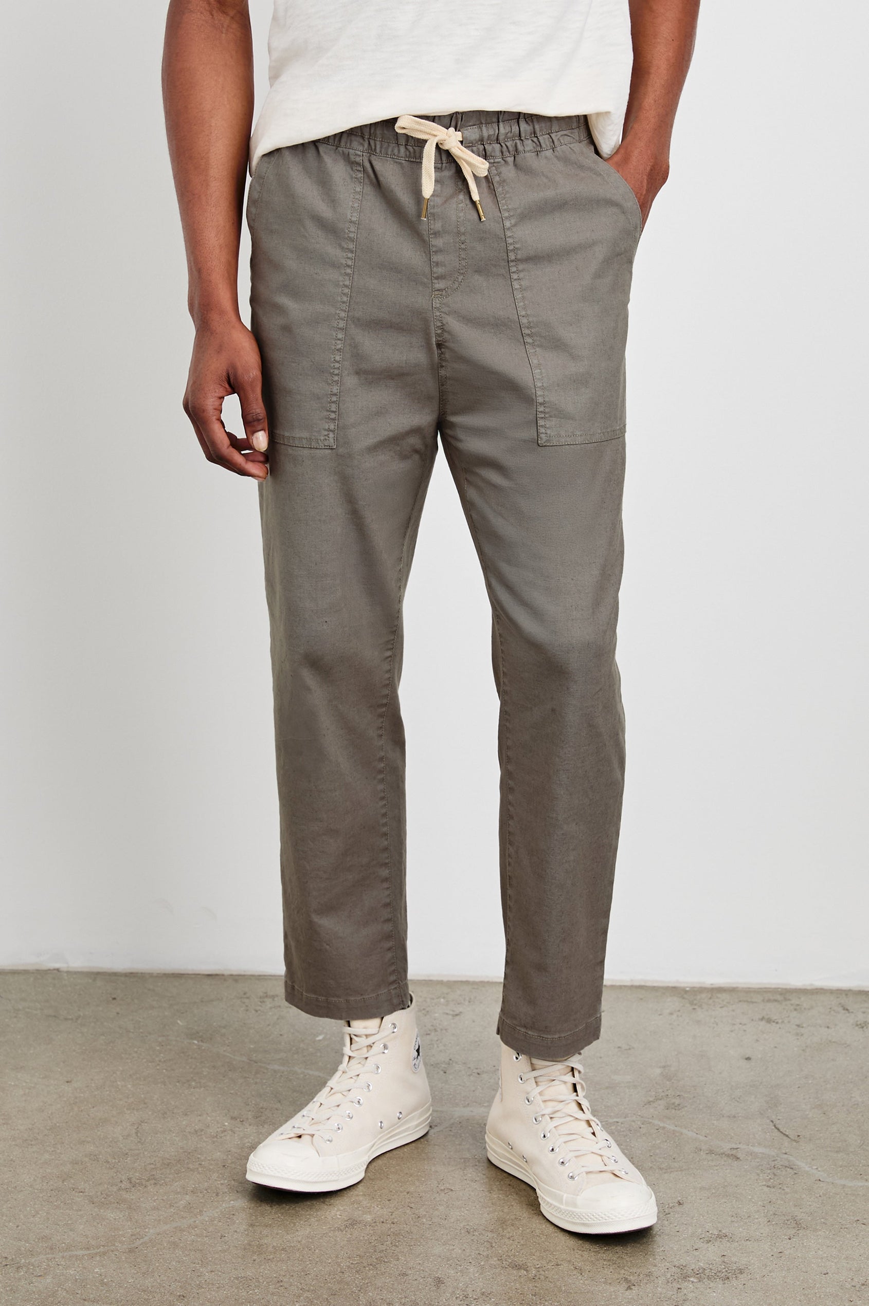 Gobi Pants with Drawstring Waist, Two Large Front Pockets and Two Back Buttoned Patch Pockets in Fallen Rock Colorway - Front View Featured on Model
