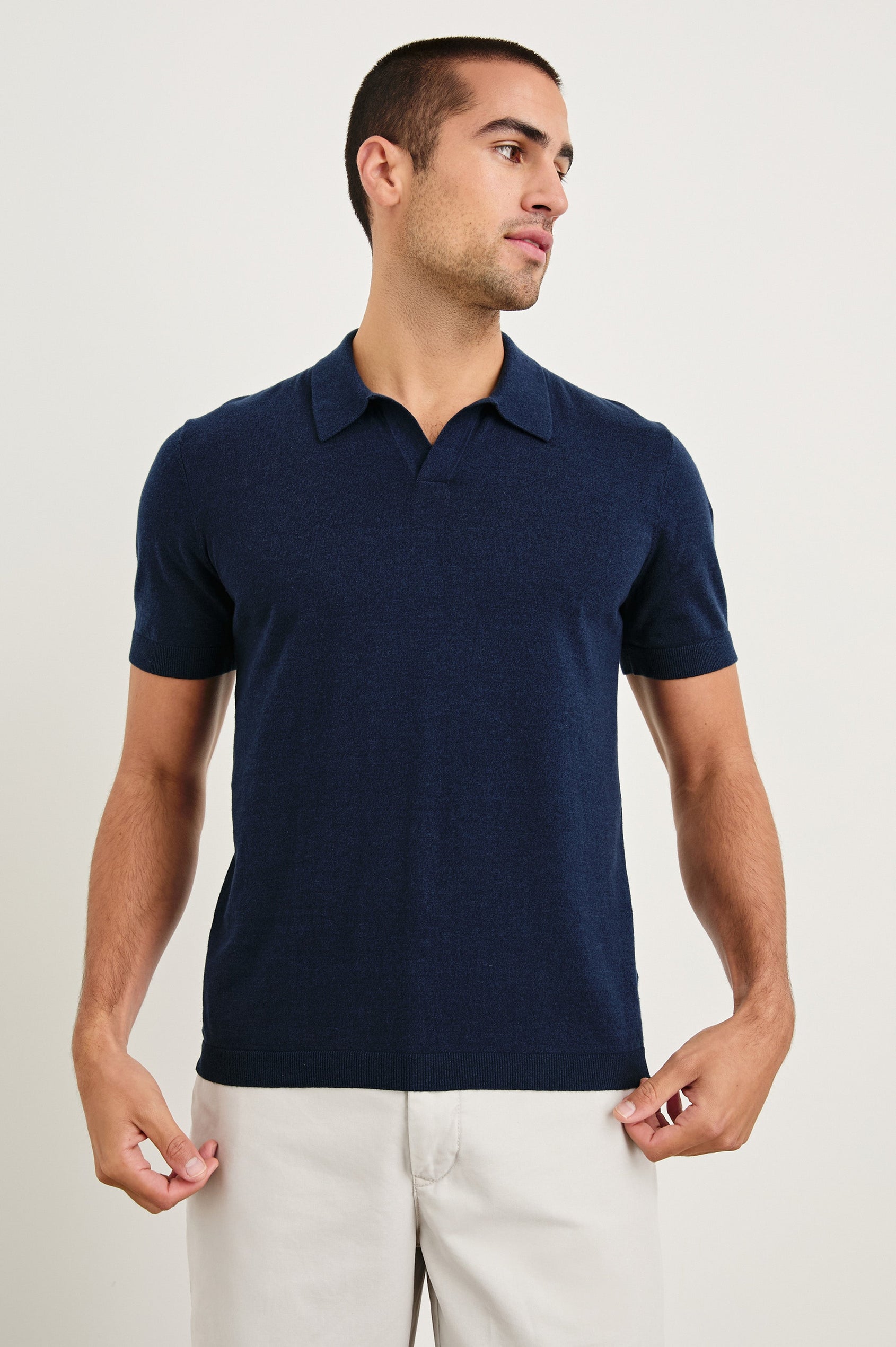 Hayden cotton short sleeve polo with collar and short placket in Navy - front view on model