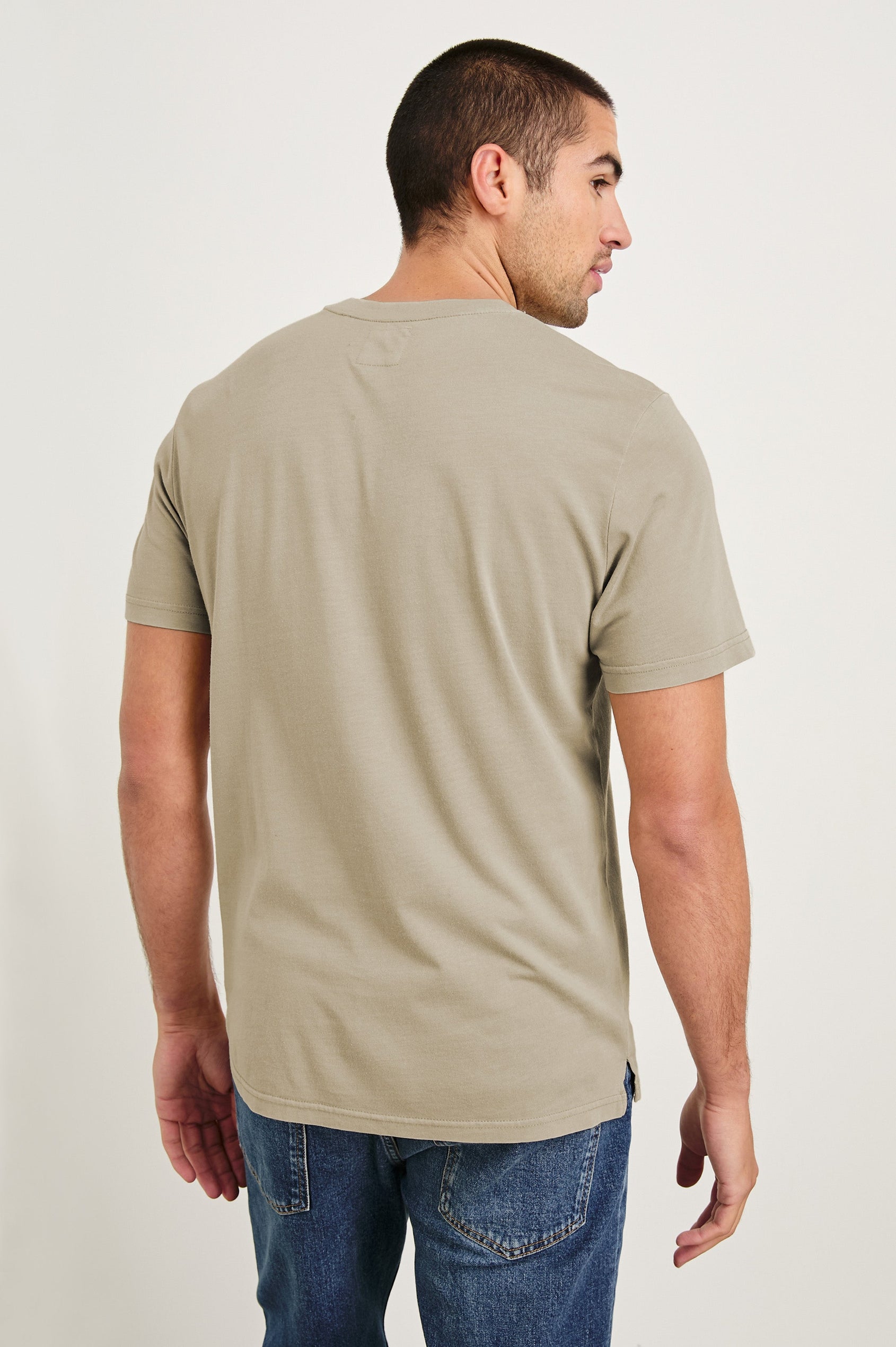 Johnny cotton jersey t-shirt with front chest pocket in Desert Sand - back view on model