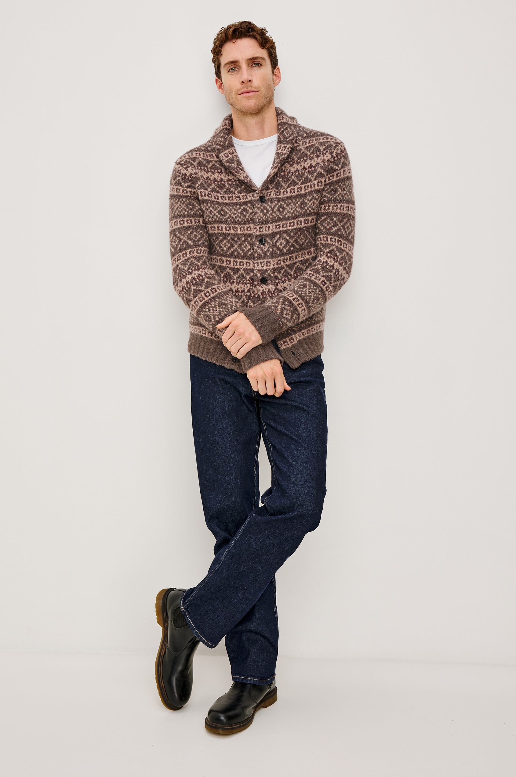 Kallio is a button front cardigan with a lapel in Amiata Farisle. Front full body view featured on model.