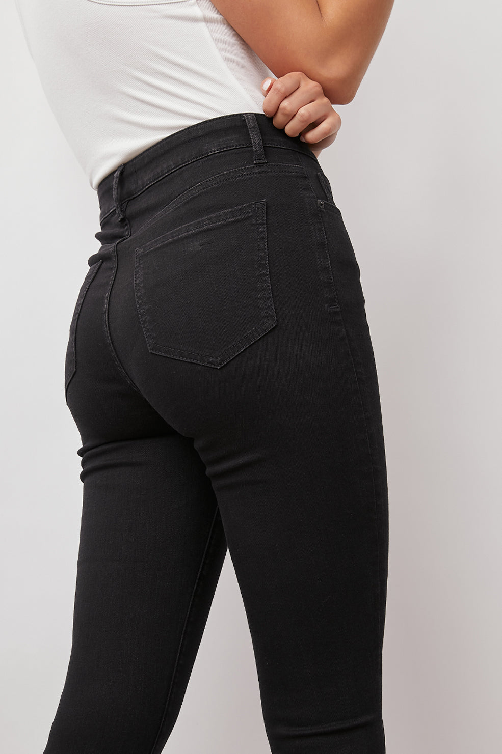 The Larchmont Onyx High Rise Skinny Pants - back pocket detail