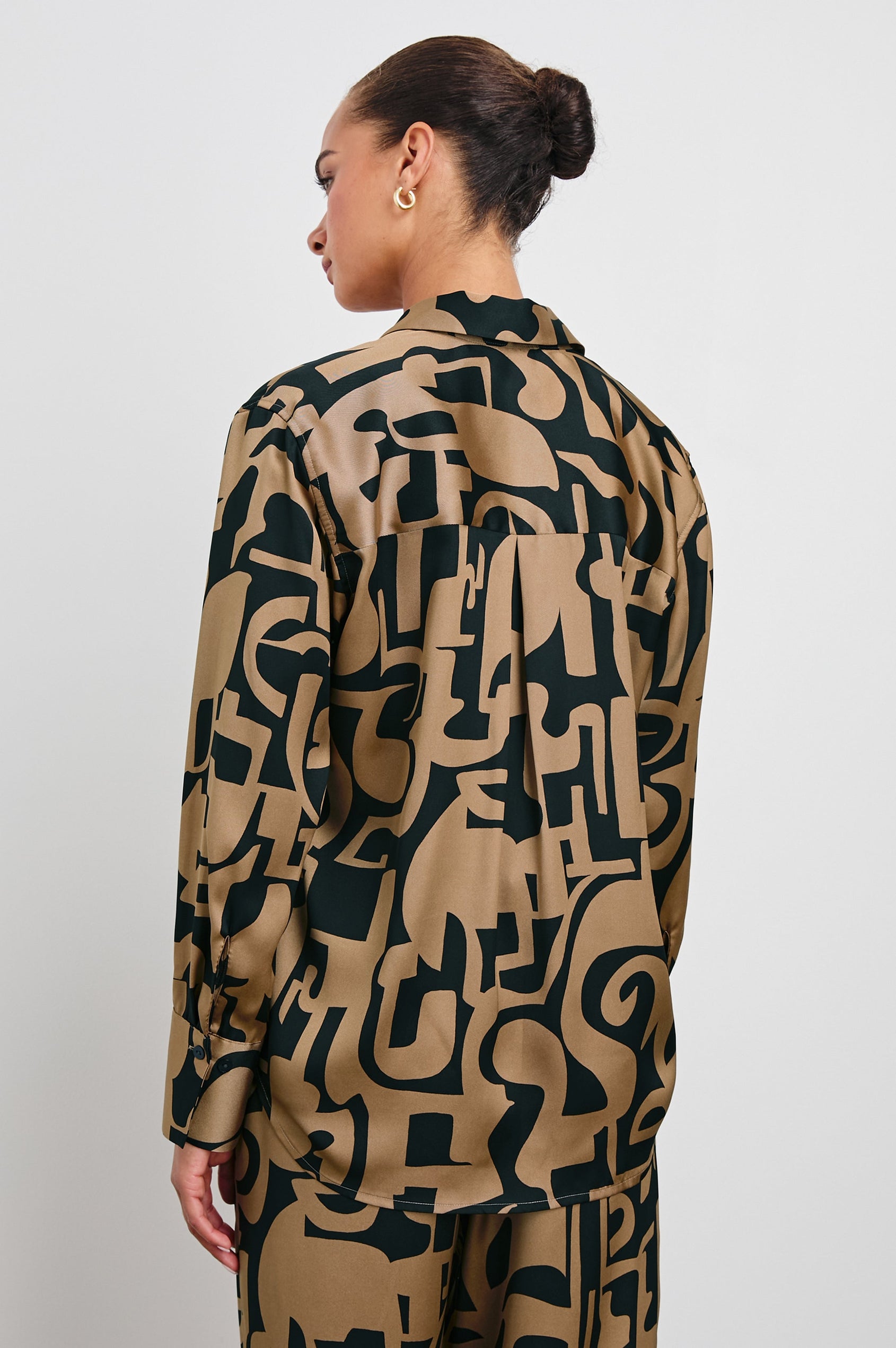 Ledger Long-Sleeve Button Down in Santorini Sand Colorway, a black and sand-colored design - Back View Featured on Model