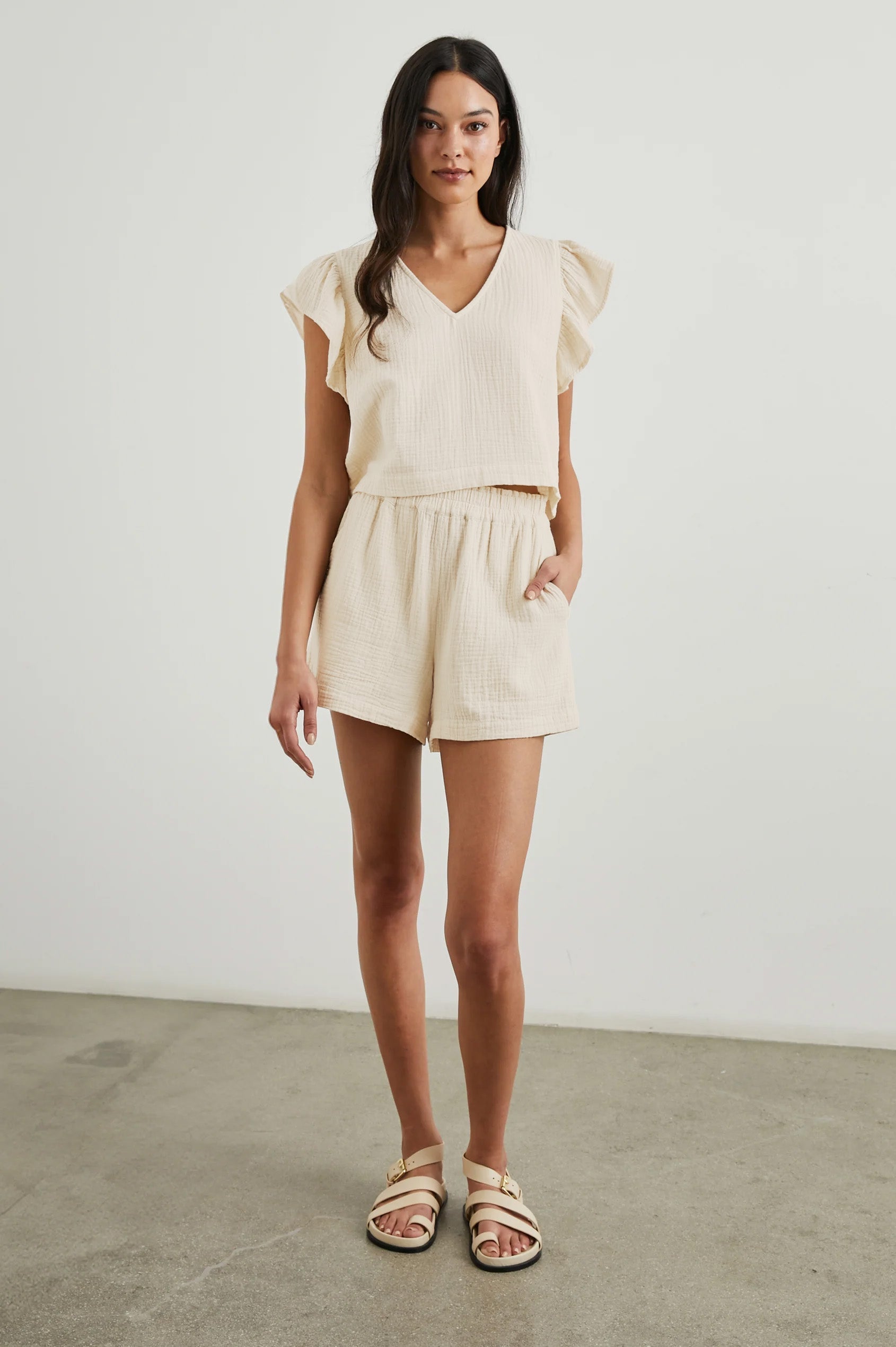 Leighton Shorts with Textured Fabric, a Smocked Elastic Waist, and Large Front Pockets in Flax Colorway - Front Full Body View Featured on Model