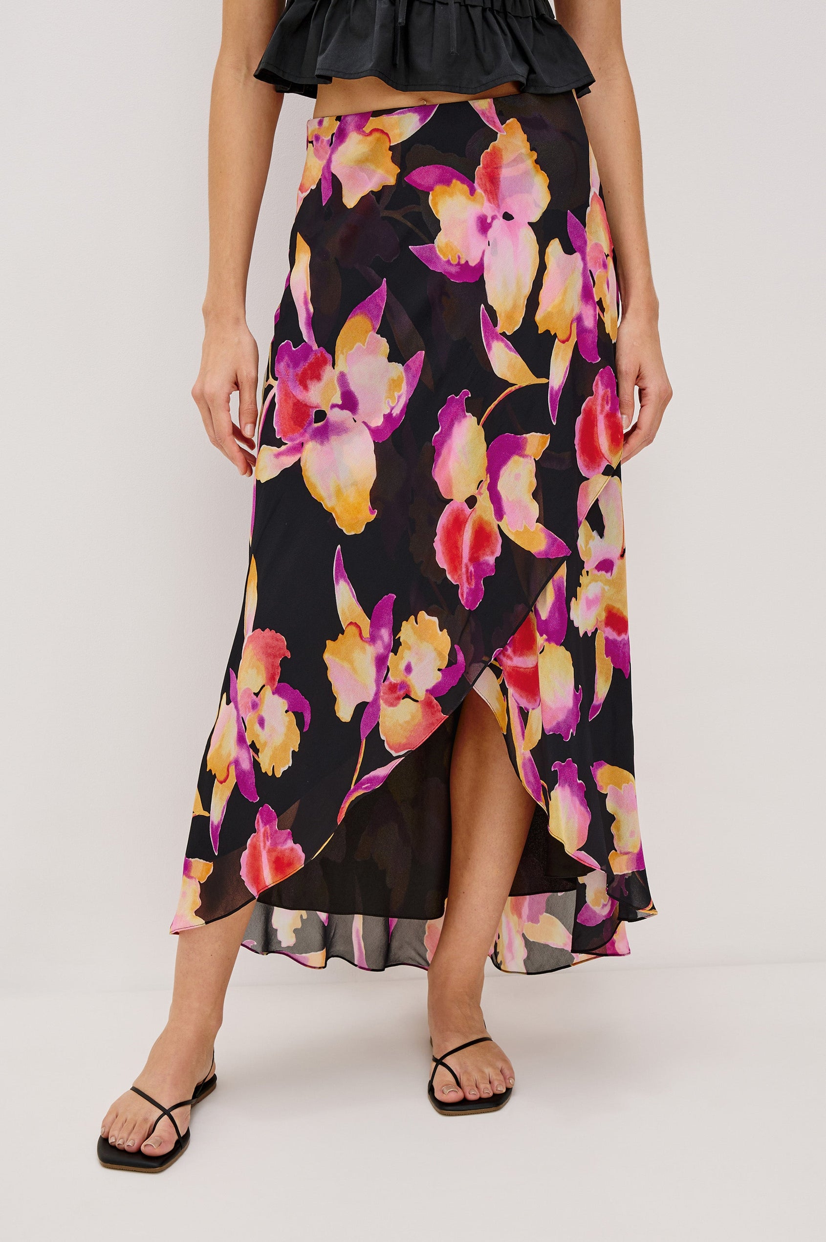 Lenora Cross Front Skirt, High-Low Midi Length, Hidden Elastic Waistband, Lined, in Dusk Orchid Colorway. Front View Shown on Model.