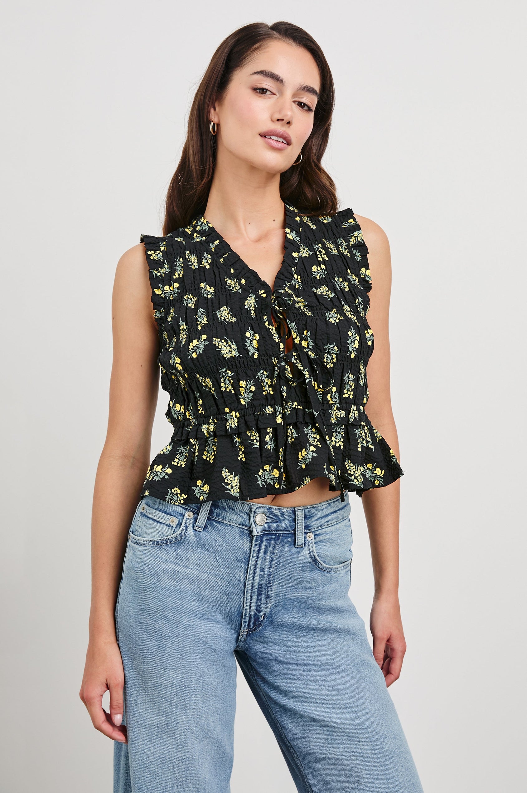 Martine peplum tank top with adjustable front closure ties in Dark Amaryllis - front view on model