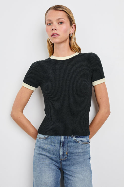 Meredith Short-Sleeve Ribbed Top with Crew Neckline in Black Ivory Colorway, with Ivory trim at the Neckline and Cuffs - Front View Featured on Model