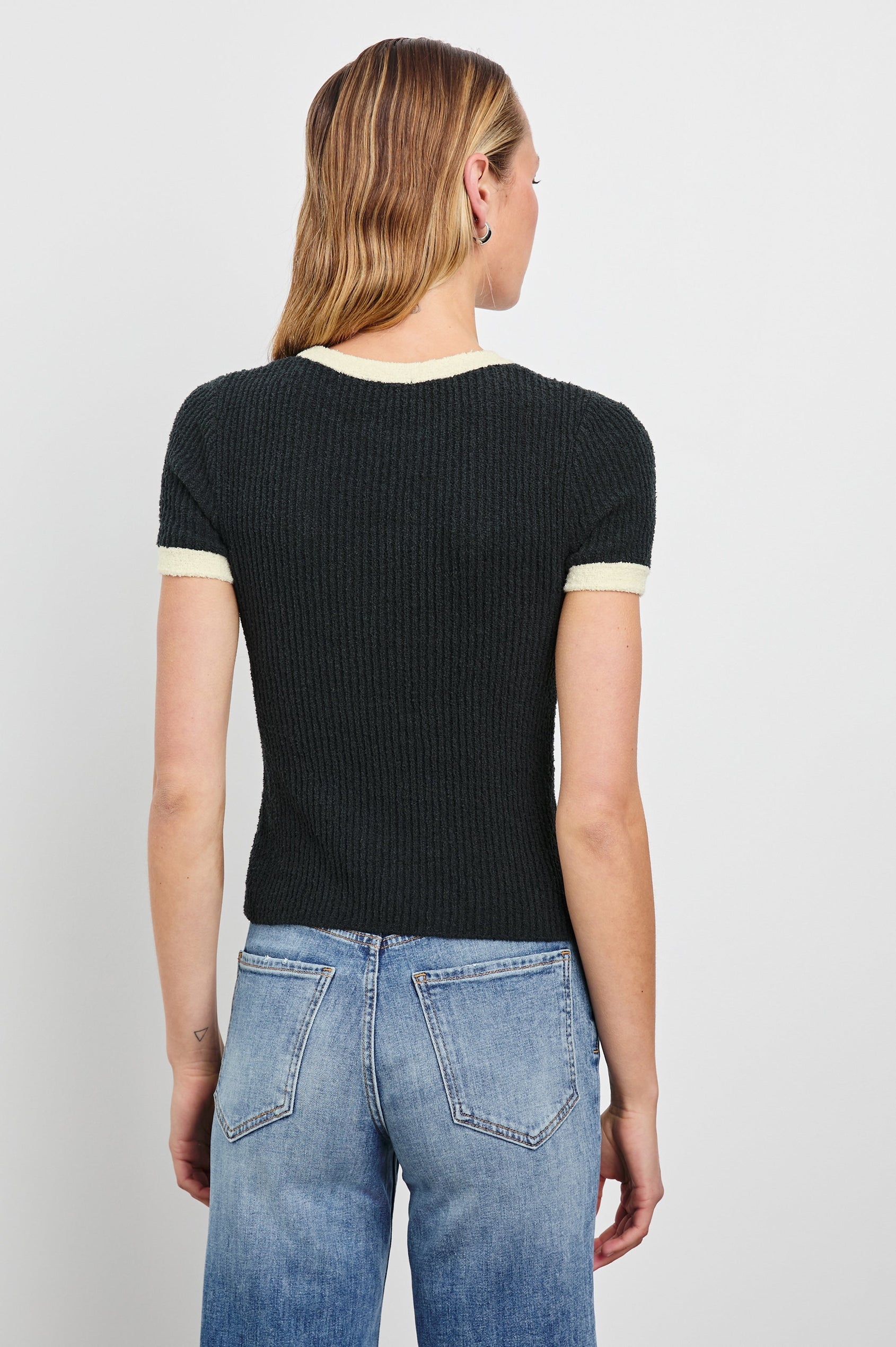 Meredith Short-Sleeve Ribbed Top with Crew Neckline in Black Ivory Colorway, with Ivory trim at the Neckline and Cuffs - Back View Featured on Model