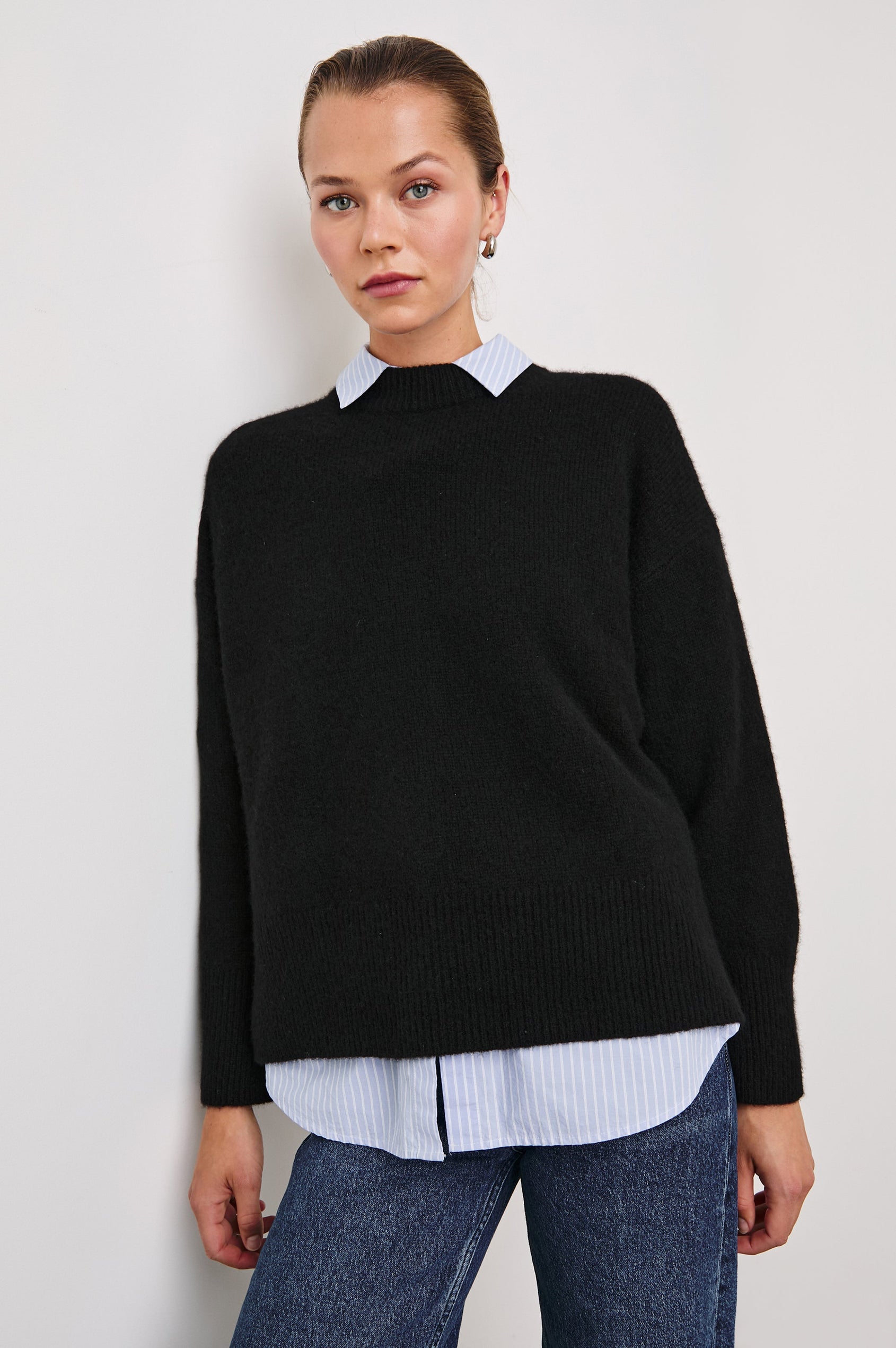 Miranda Long-Sleeve Sweater with a Mock Neck, Side Slits, and Ribbed Trim in Oatmeal Colorway - Front View Featured on Model