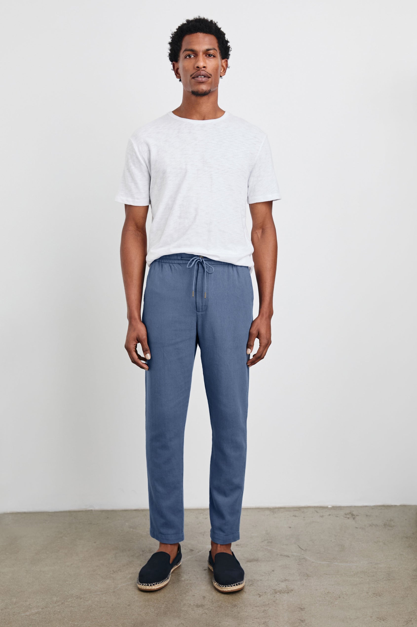 Neil T-Shirt with a Crew Neck in White Colorway - Front Full Body View Featured on Model
