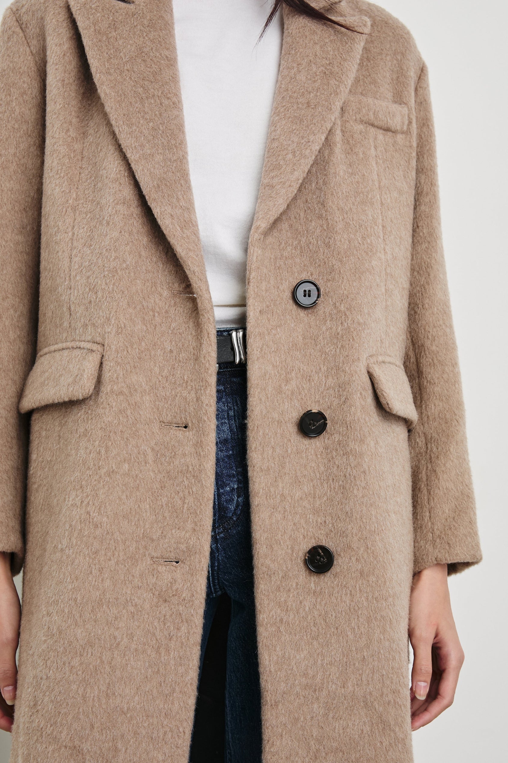Opera Below-the-Knee Length Coat with V Neck, Three-Button Closure and Two Front Flap Patch Pockets in Heather Latte Colorway - Front View Featured on Model