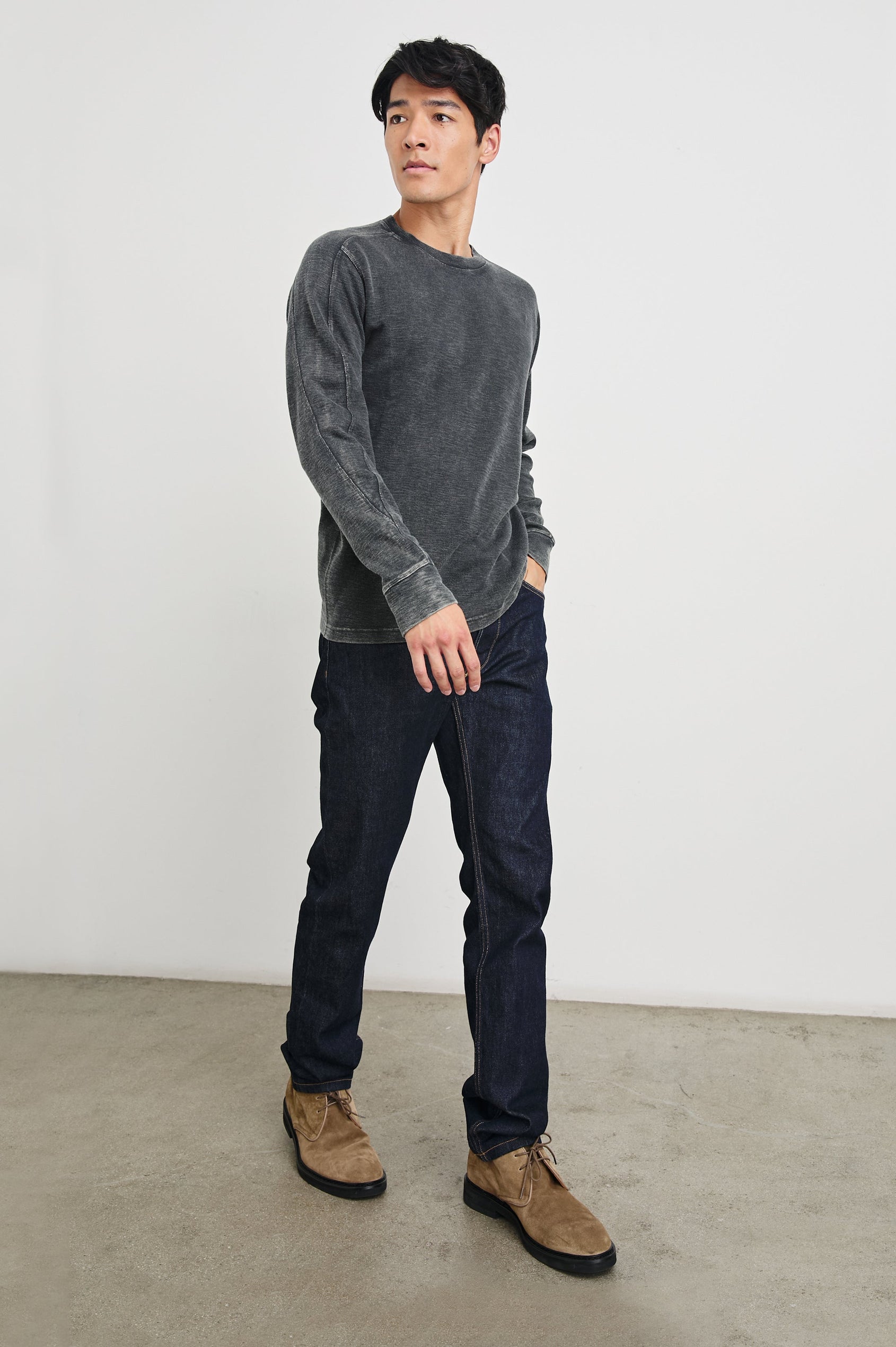 Rheese Long-Sleeve Thermal with Crew Neck and Statement Seams on Sleeves and Back in Washed Black Colorway - Front Full Body View Featured on Model