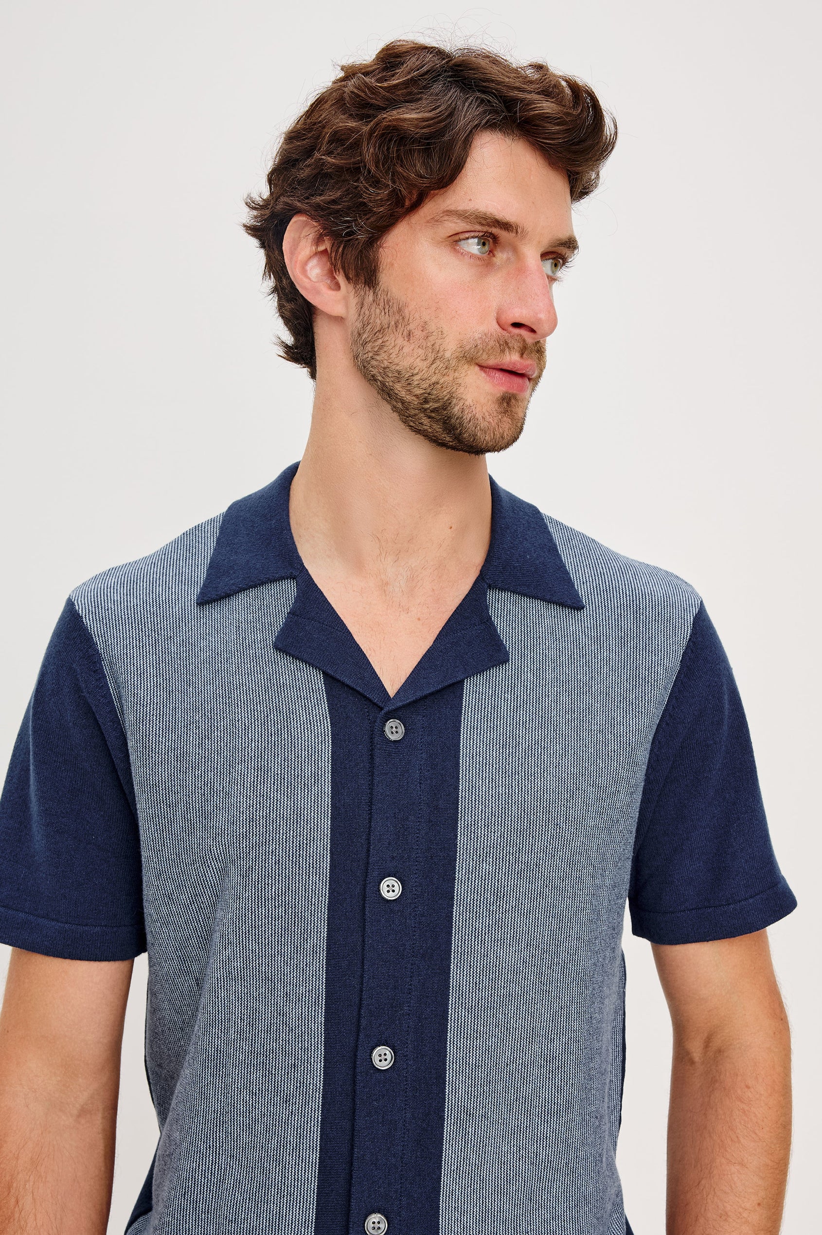 Silas short sleeve knit button down shirt with retro front striped design features in Navy Lagoon Stripe - front detail view on model