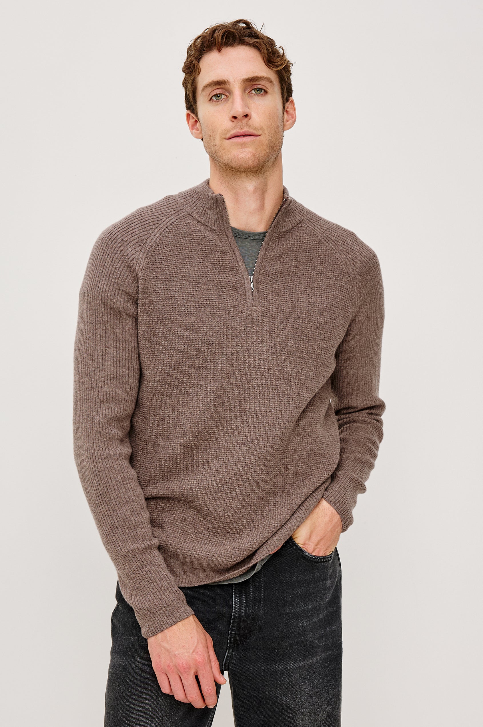 Stark long-sleeve quarter zip features a mock neck, waffle torso, and ribbed sleeves in Brown Melange colorway. Front View Featured on Model
