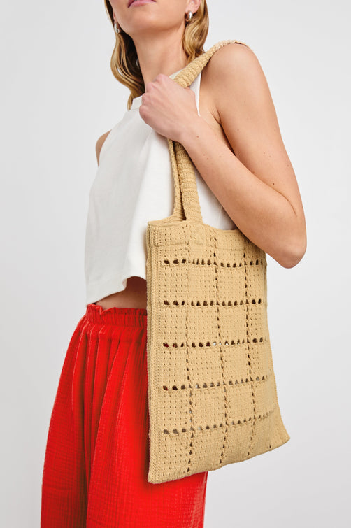Crochet Rectangular Tote with Patchwork Grid Drop stiches in Rattan Colorway - Side View Featured on Model