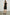 Adaline Ribbed, Sleeveless, Above-the-Knee Dress with Shoulder Straps and a V Neck in Black Colorway - Back Full Body View Featured on Model  