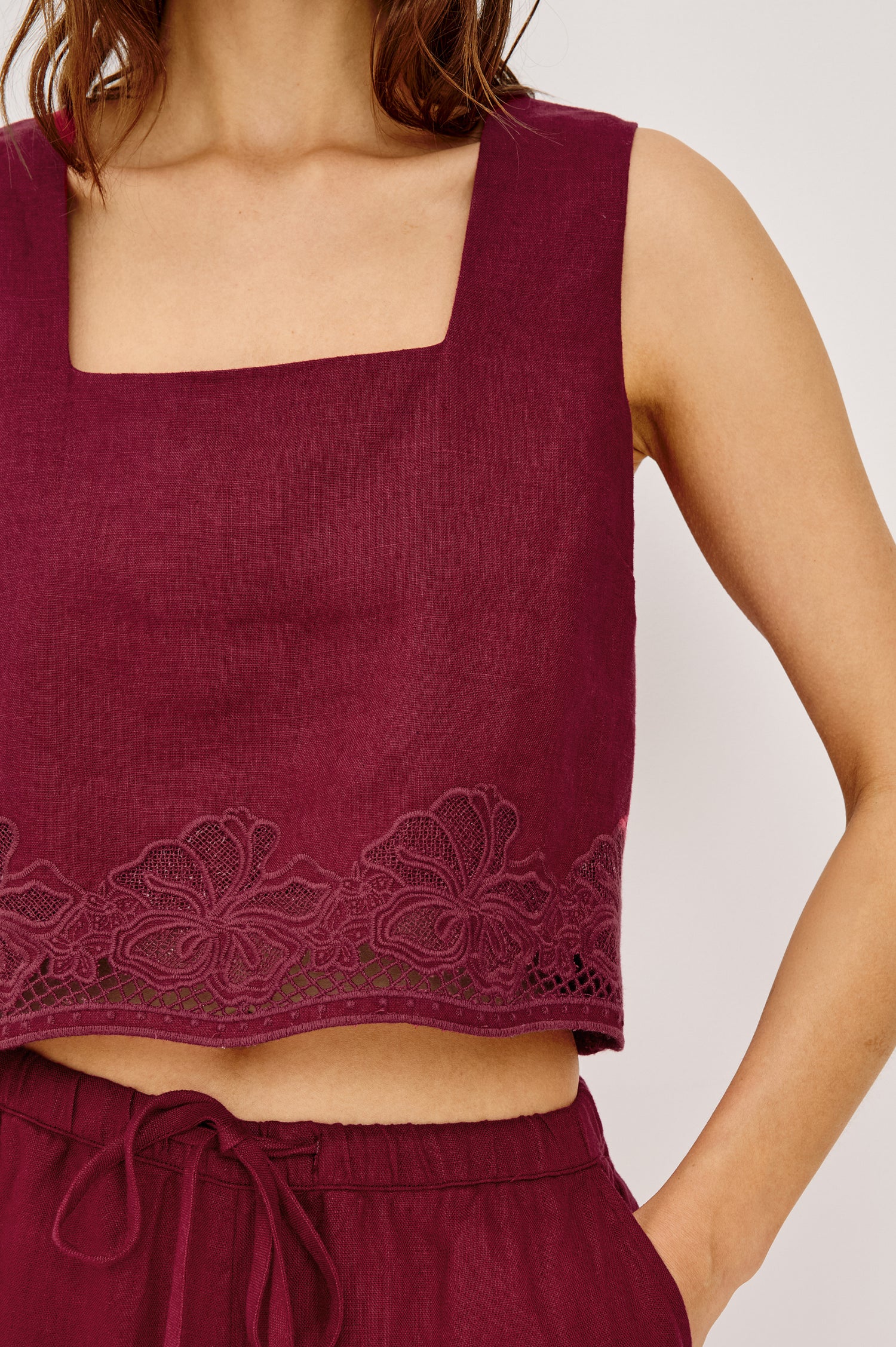 Akira Tank Top in Linen With Square Neckline Wide Fixed Shoulder Straps and Cropped Loose Fit in Berry Hibiscus Embroidery Colorway - Upper Body Close Up Front VIew Featured on Model