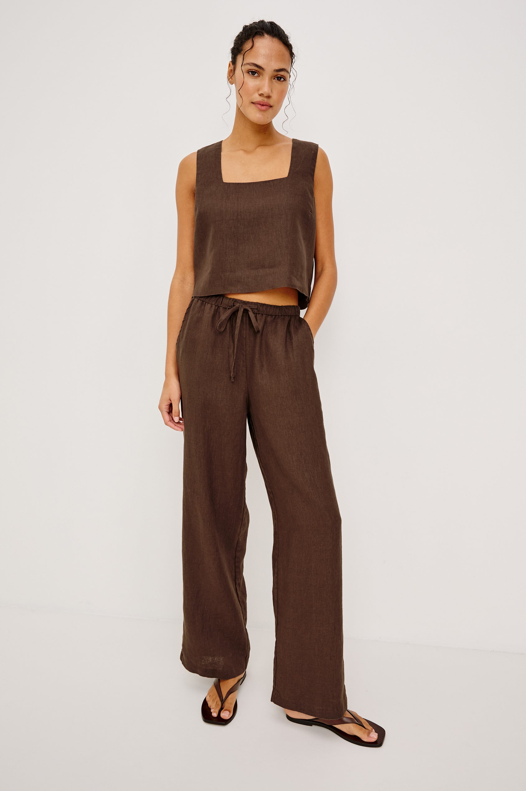 Akira Tank Top in Linen With Square Neckline Wide Fixed Shoulder Straps and Cropped Loose Fit in Espresso Colorway - Upper Body Front VIew Featured on Model