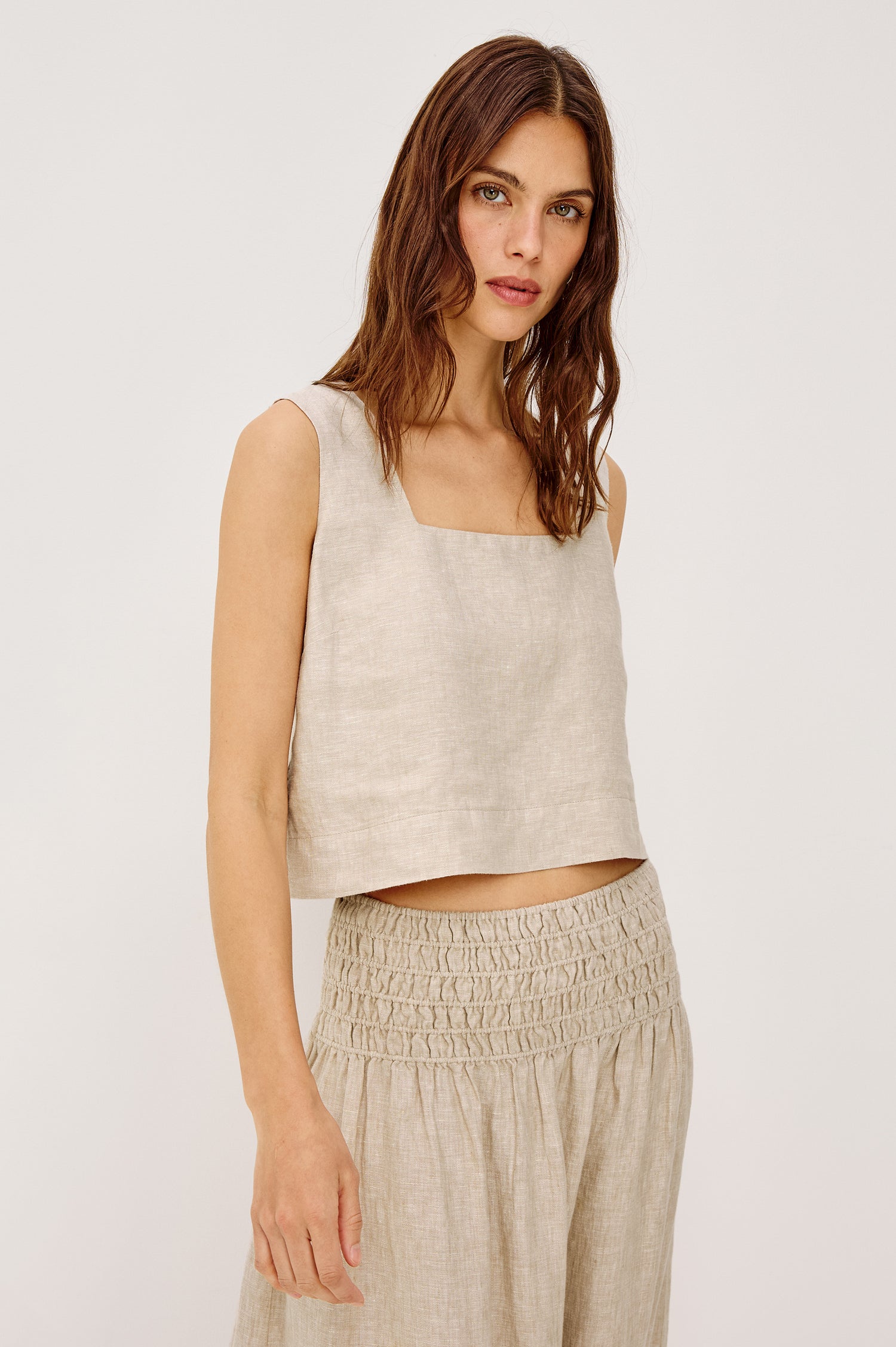 Akira Sleeveless Crop Top with Square Neckline and Wide Shoulder Straps in Heathered Flax Colorway - Front View Featured on Model