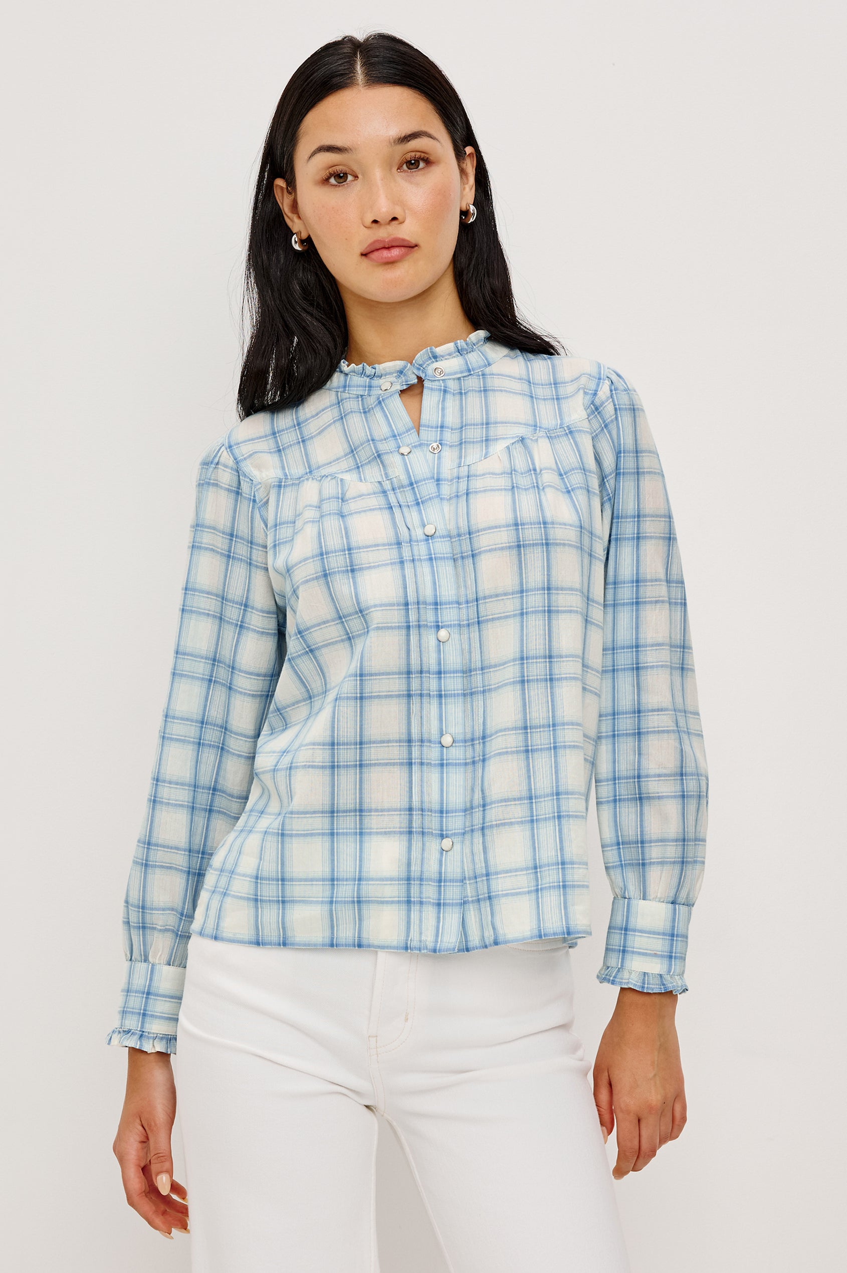 Alanna Long Sleeve Shirt with Snaps Down the Front, a Ruffled Collar, Banded Ruffed Cuffs, and Pleats at the Yoke Seam in Bluebell Ivory Colorway - Upper Body Front View fFeatured on Model