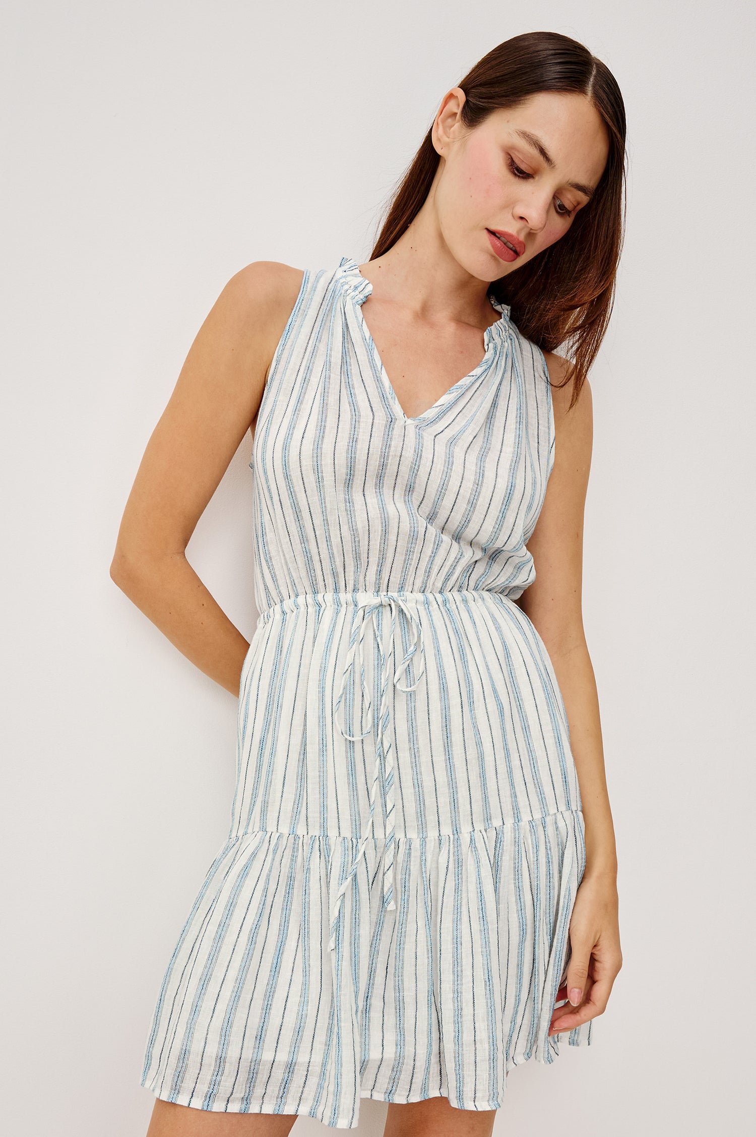 Albany Luxe Linen Ruffled Band Split V Neck Collar Sleeveless Mini Dress in Windward Stripe Colorway - Upper Body Front View Featured on Model