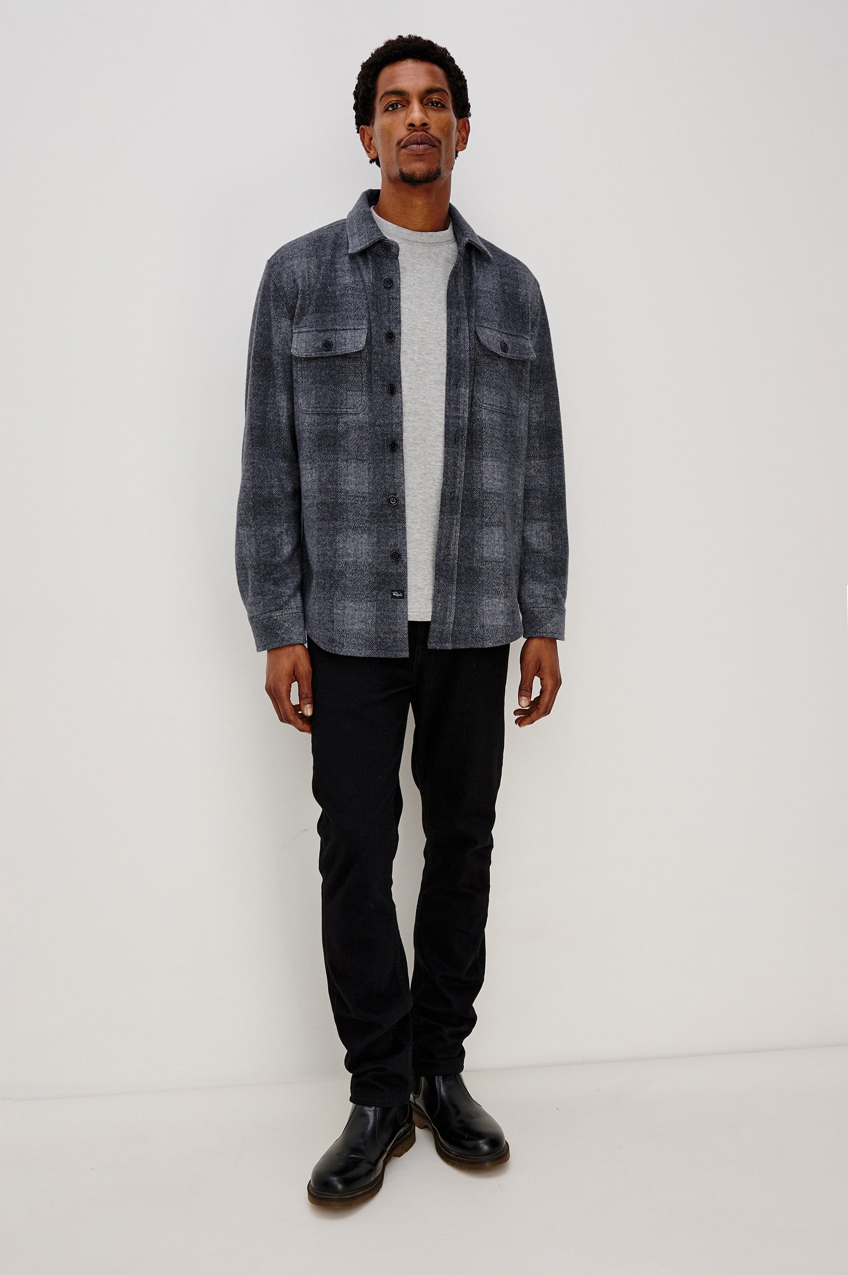 Alder Long-Sleeve Button up with Two Buttoned Chest Flap Pockets in Dusk Eclipse Colorway, a plaid - Front Unbuttoned Full Body View Featured on Model