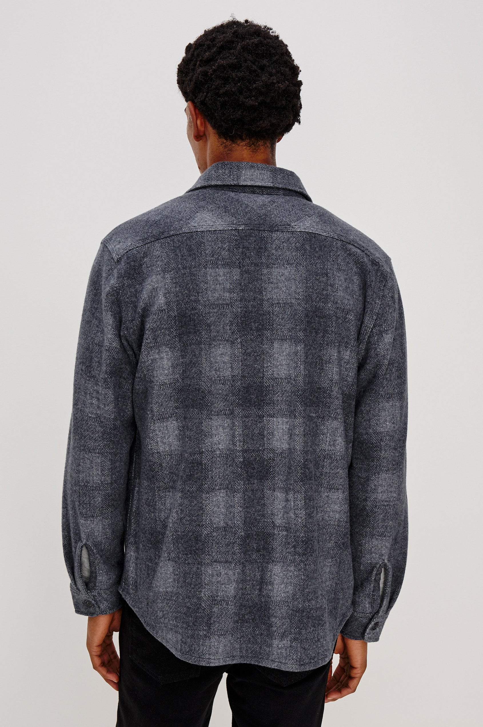 Alder Long-Sleeve Button up with Two Buttoned Chest Flap Pockets in Dusk Eclipse Colorway, a plaid - Back View Featured on Model
