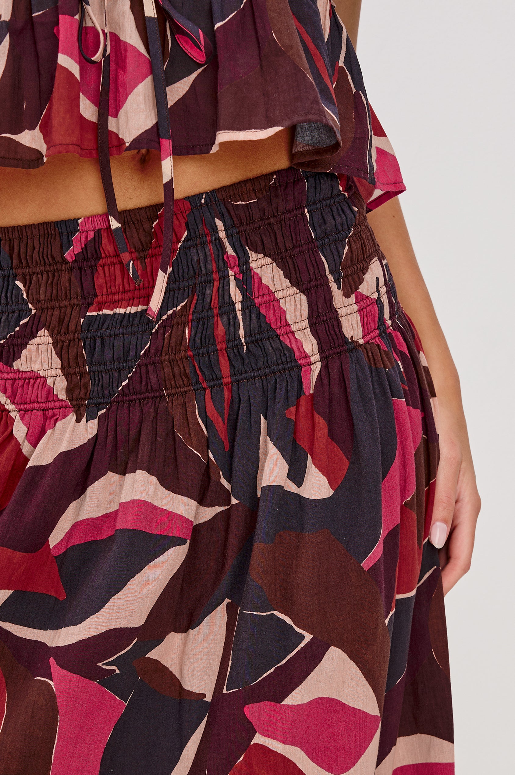 Alessa Midi Skirt with a Wide Elastic Gathered Waistband in Paradise Colorway. Close Up View Shown on Model.