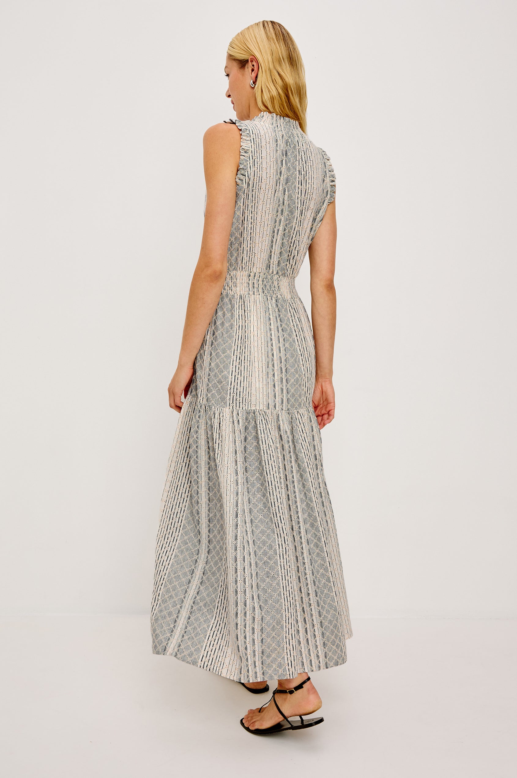 Alessi Maxi Dress in Linen With Smocked Split V-Neckline With Center-Front Ties Diamond Eyelet Detailing All Over Ruffled Trim and Fully Lined Tiered Skirt in Striped Eyelet Colorway - Full Body Front View Featured on Model