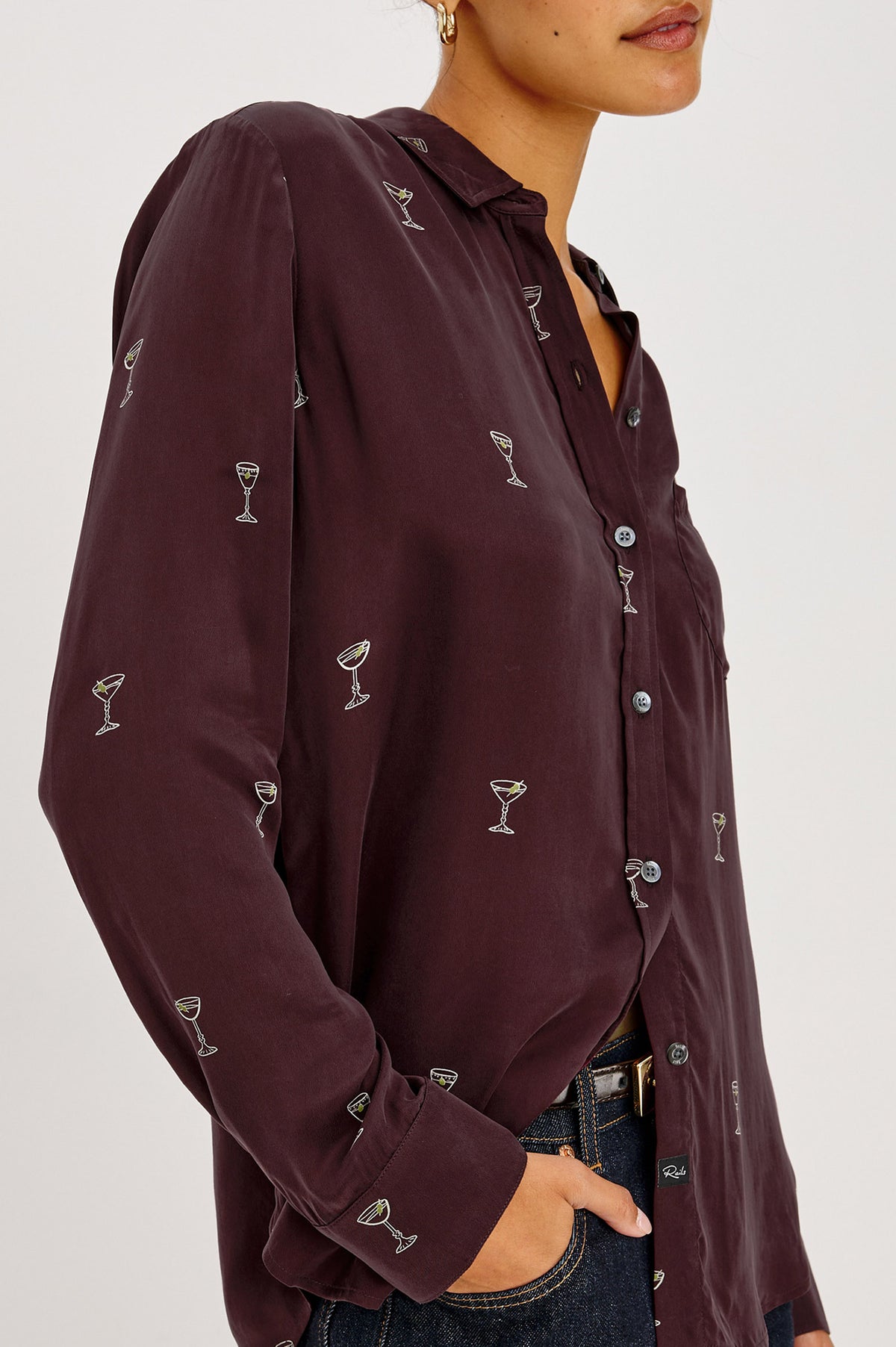 Alyssa Shirt in Martini Print Silk With Front Buttons, Single Chest Pocket, Point Collar, and Long Sleeves in Oxblood Martini Colorway - Upper Body Front Detail View Featured on Model.