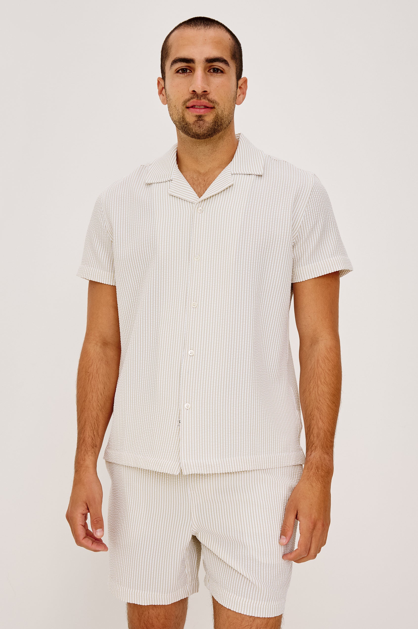Amalfi Button-Up Short Sleeve Shirt in Lightweight Stretch Linen-Blend With a Notched Collar and Classic Fit in Khaki White Seersucker - Upper Body Front View Featured on Model