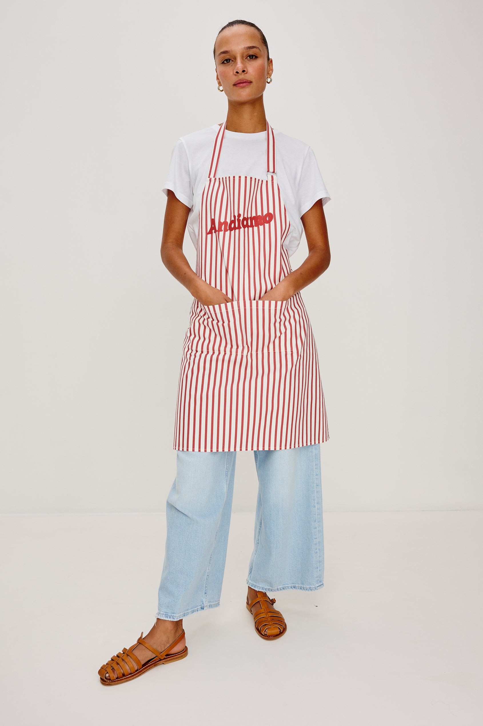 Apron in Cotton With Adjustable Halter Strap and Back Ties in Ravello Stripe Colorway - Full Body Front View Featured on Model