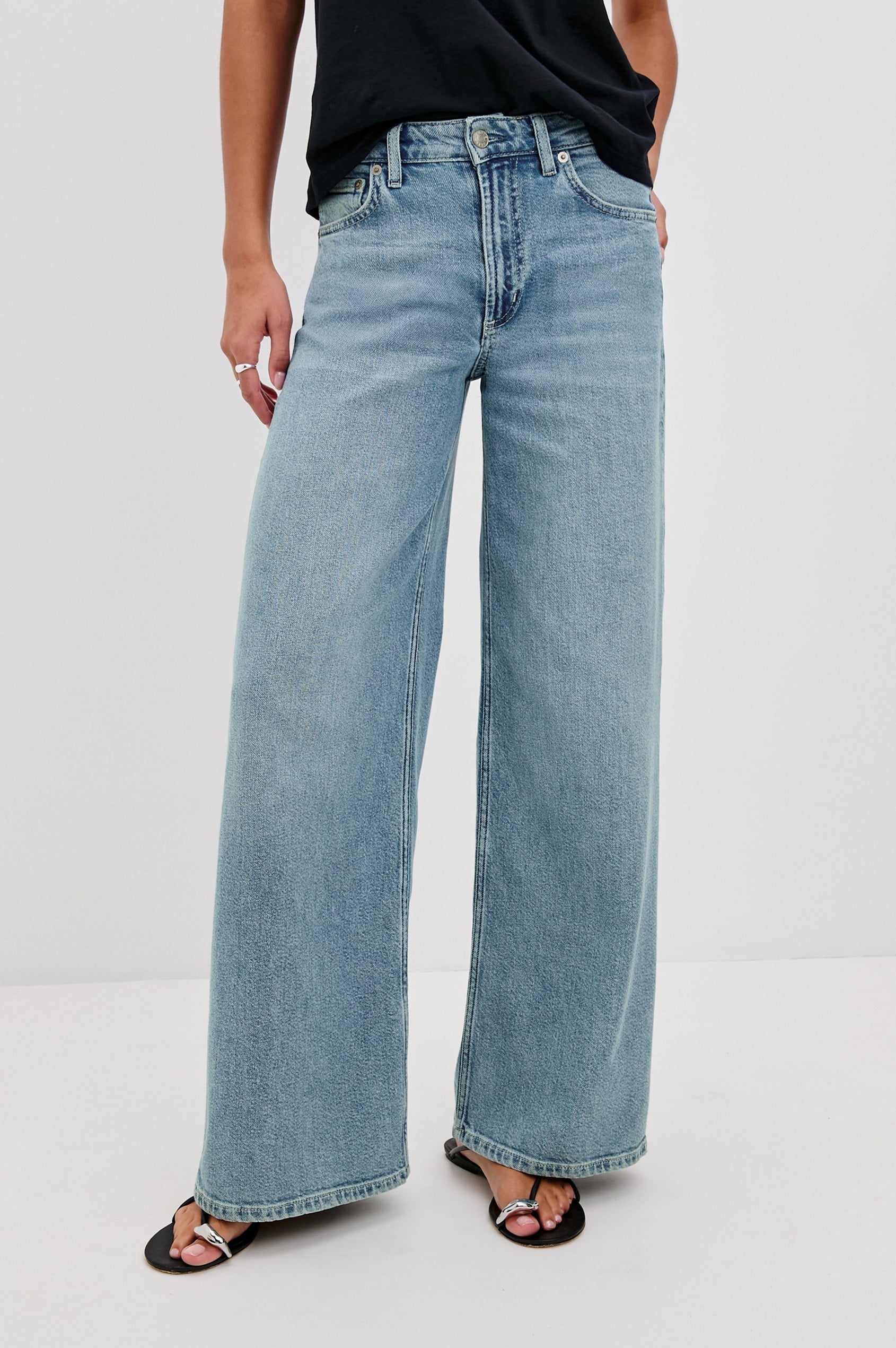 Angeleno mid rise slouchy wide leg jean in light wash Blue Eyed Girl - front view on model