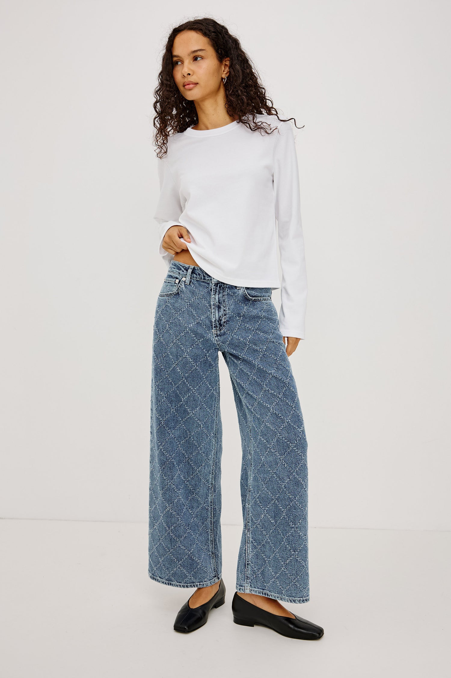 Angeleno Wide Leg Crop Jean in Rigid Drapey Denim With Mid-Rise Cropped Fit, 5-Pockets, Self-Tie Shoelace Belt, Frayed Waistband, and Zip-and-Hook Closure in Dark Diamond Distress Colorway - Full Body Front View Featured on Model