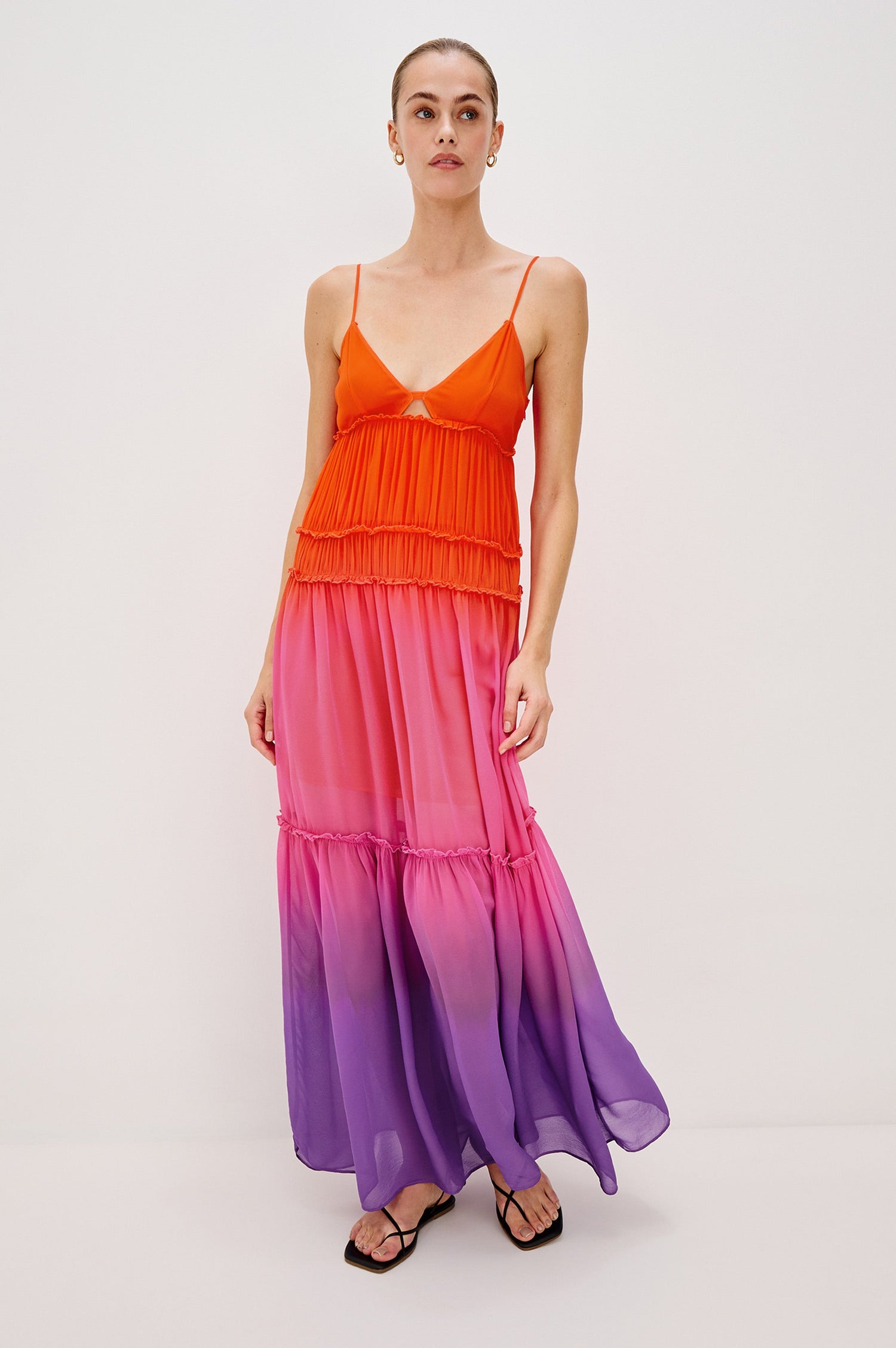 Antonella Maxi Dress with Spaghetti Straps, V-Neck, Keyhole at Center Front, Tiered Skirt with Exposed Raw Ends in Violet Dip Dye Colorway. Full Body Front View Shown on Model.