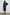 Anya High-waisted Midi Skirt in Navy Colorway - Front Full Body View Featured on Model