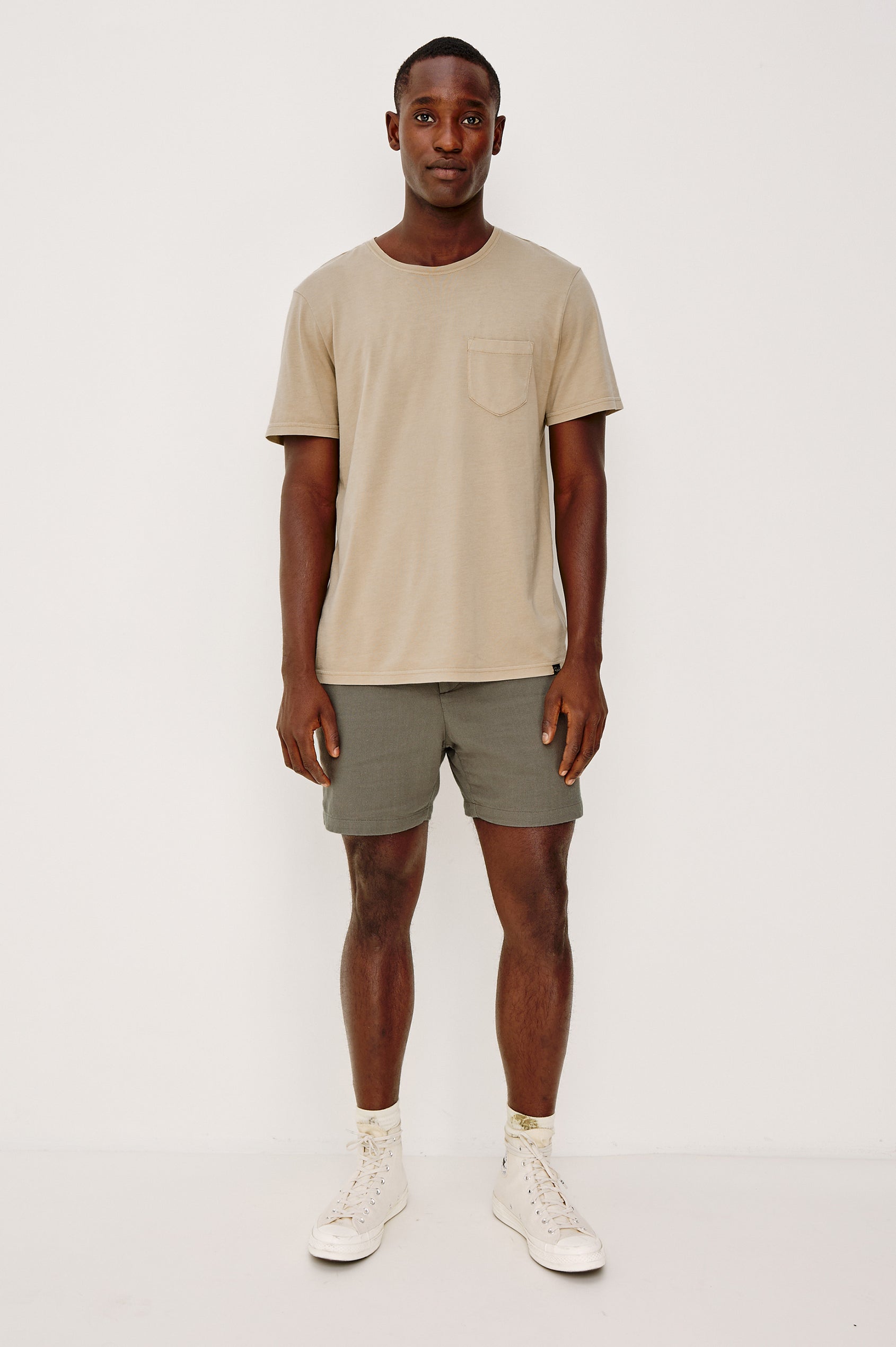 Archer Short in Unlined Cotton Linen With Relaxed Fit, Adjustable Waist Drawstring Ties, Side Pockts, and 6-Inch Inseam in Fallen Rock Colorway - Full Body Front View Featured on Model